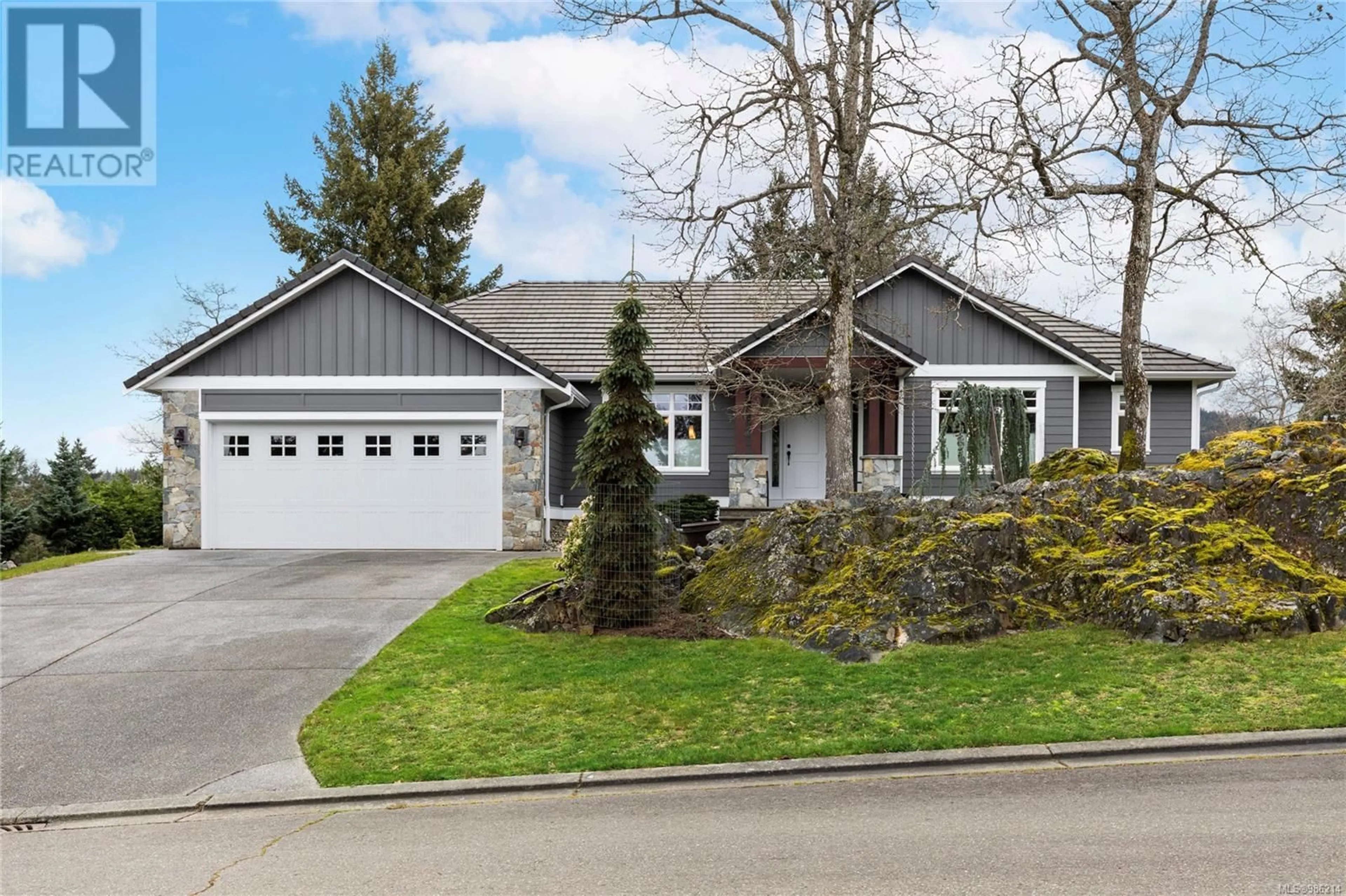 Home with vinyl exterior material, street for 1953 Highland Rd, Nanoose Bay British Columbia V9P9H6