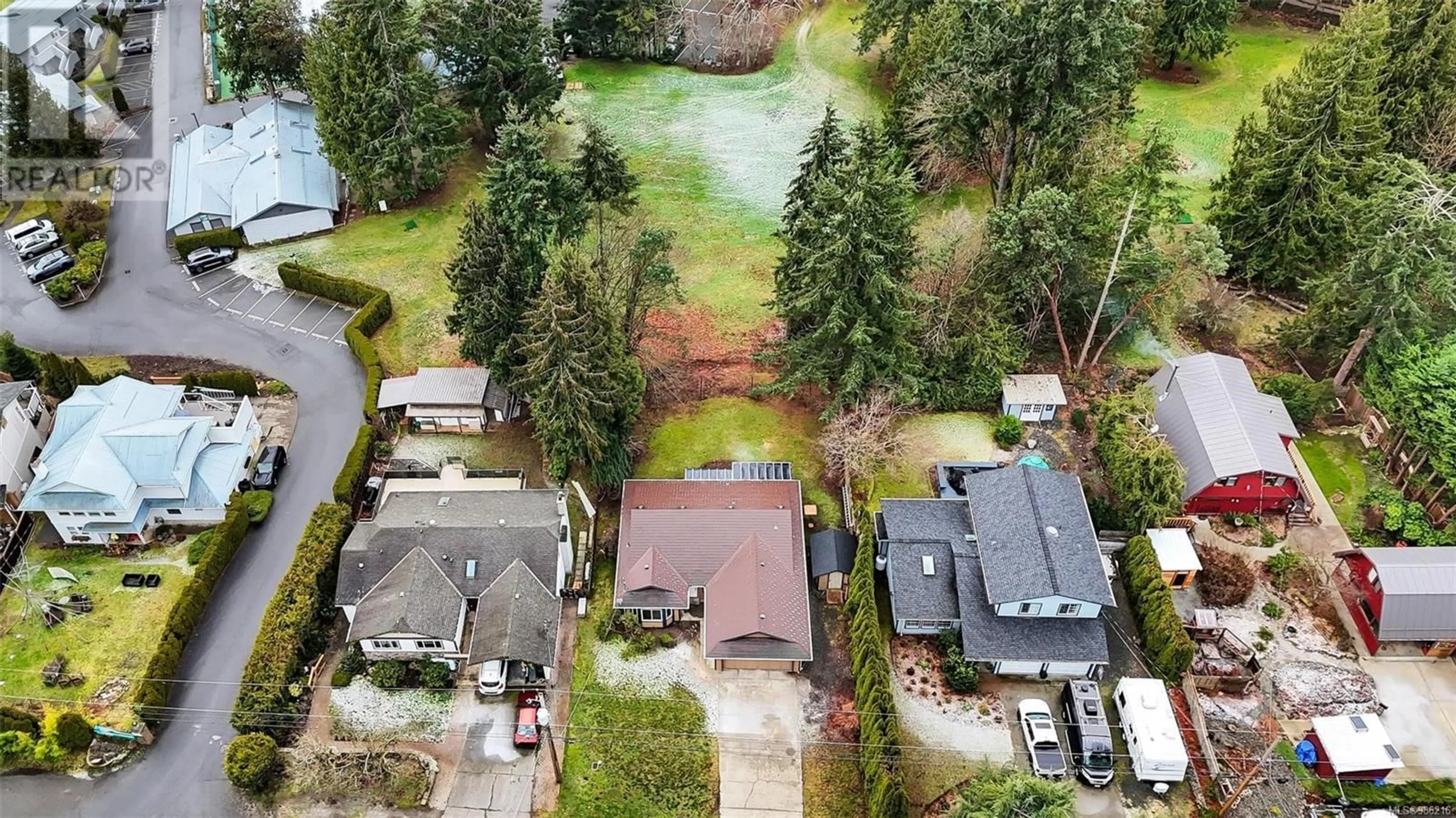 A pic from outside/outdoor area/front of a property/back of a property/a pic from drone, street for 2054 Widows Walk, Shawnigan Lake British Columbia V8H2G5