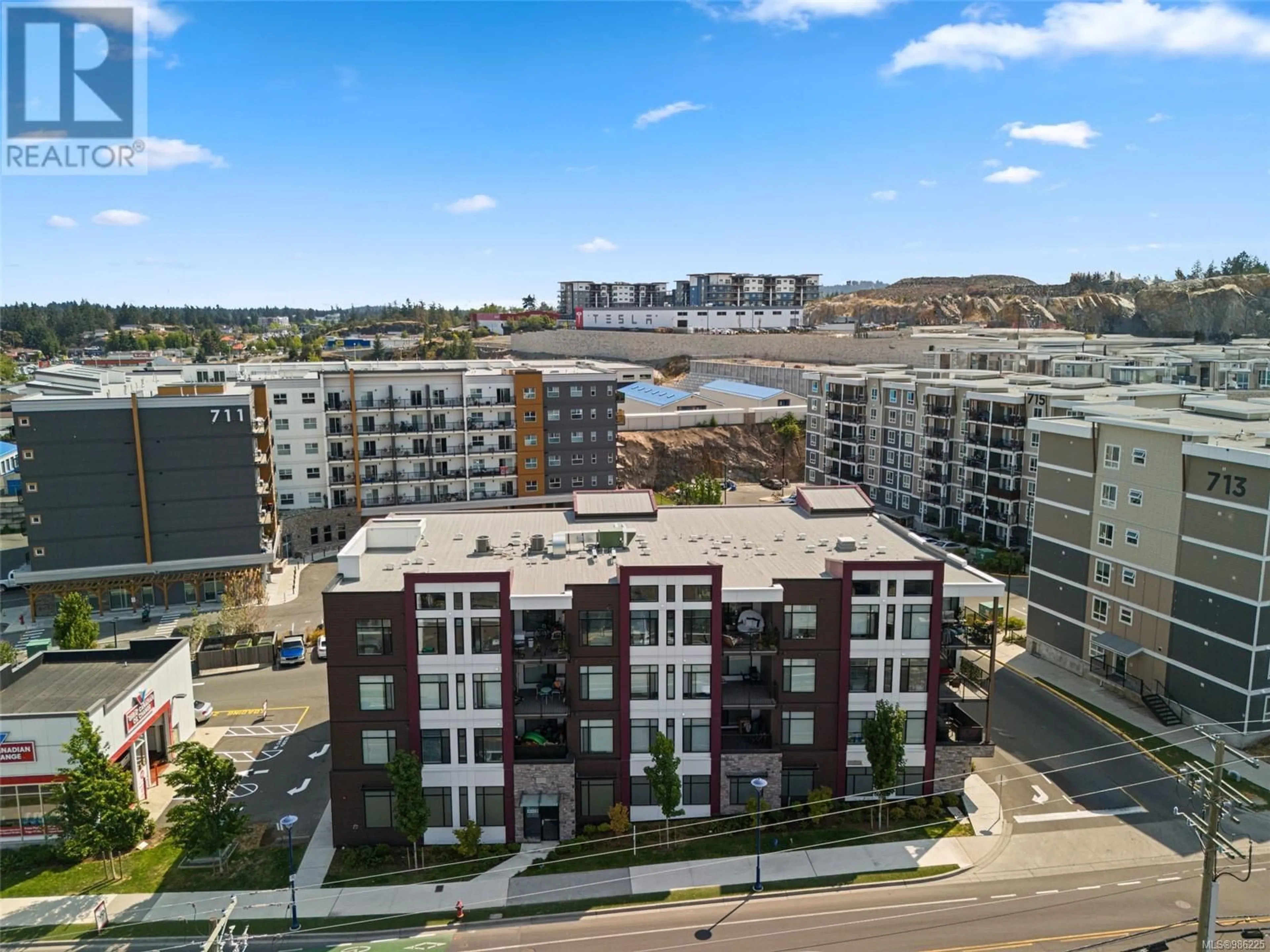 A pic from outside/outdoor area/front of a property/back of a property/a pic from drone, city buildings view from balcony for 402 707 Treanor Ave, Langford British Columbia V9B0X7