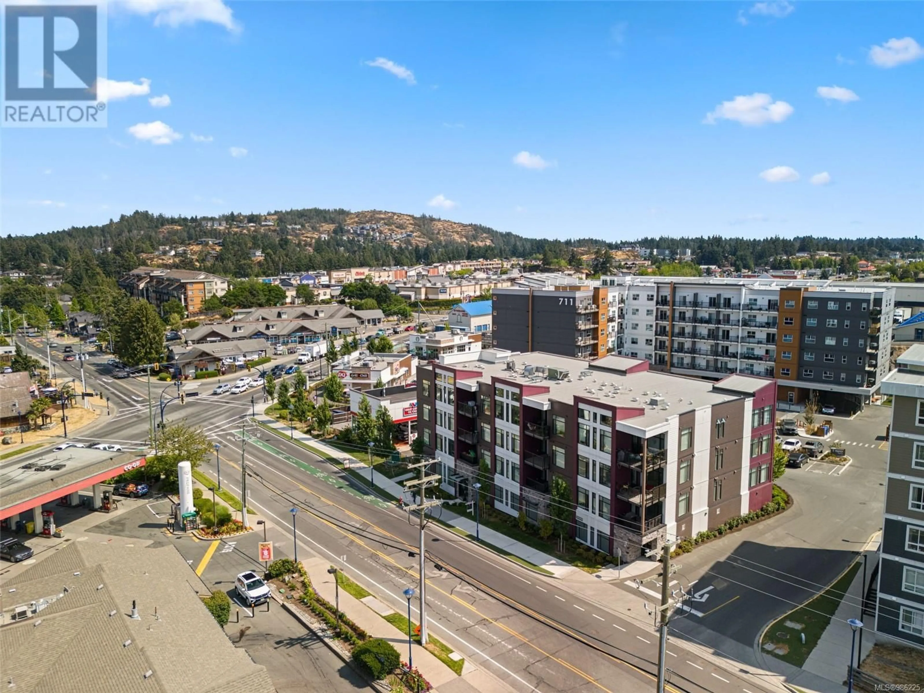 A pic from outside/outdoor area/front of a property/back of a property/a pic from drone, city buildings view from balcony for 402 707 Treanor Ave, Langford British Columbia V9B0X7