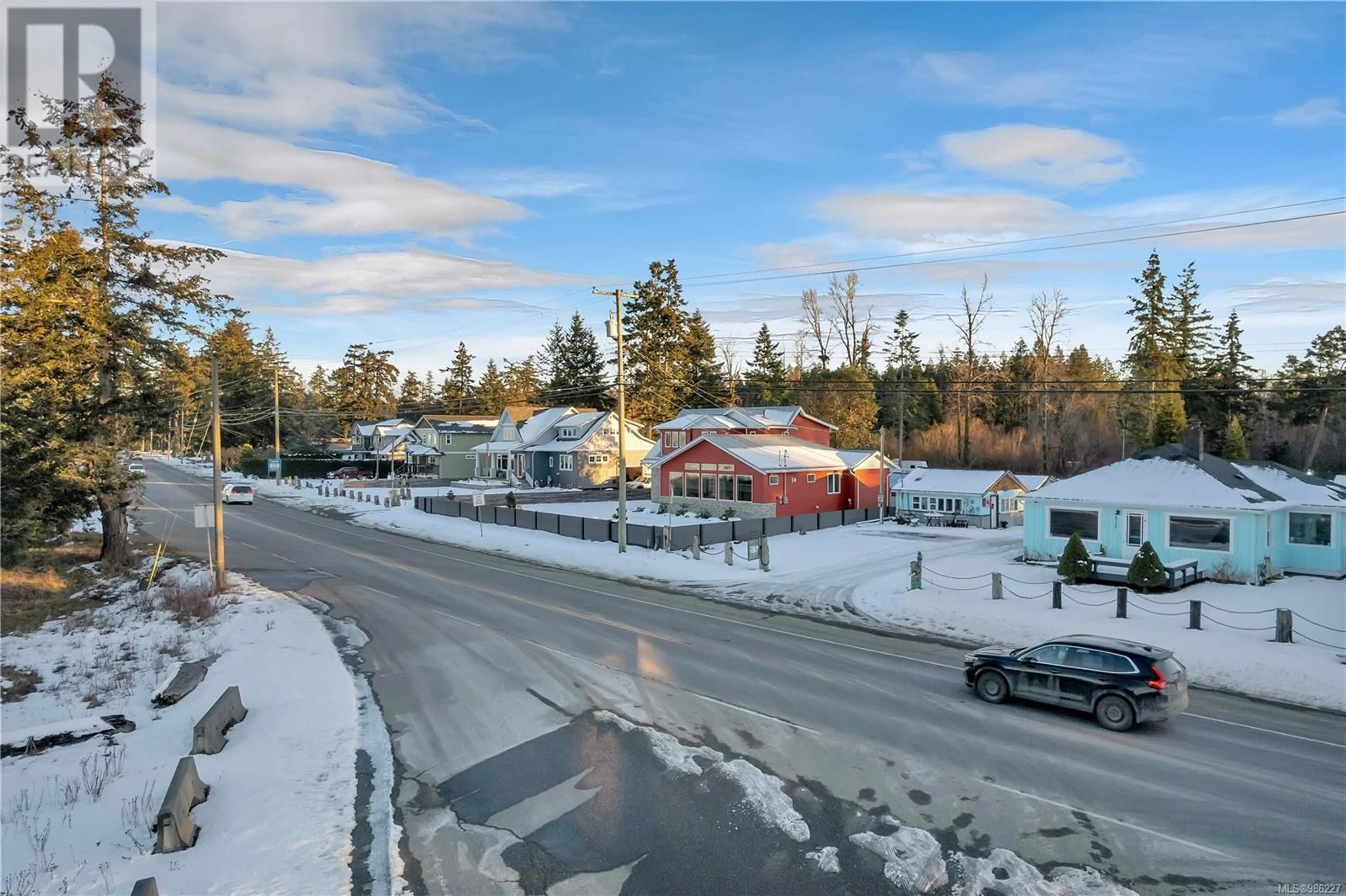 A pic from outside/outdoor area/front of a property/back of a property/a pic from drone, street for 4341 Island Hwy S, Campbell River British Columbia V9H1B7