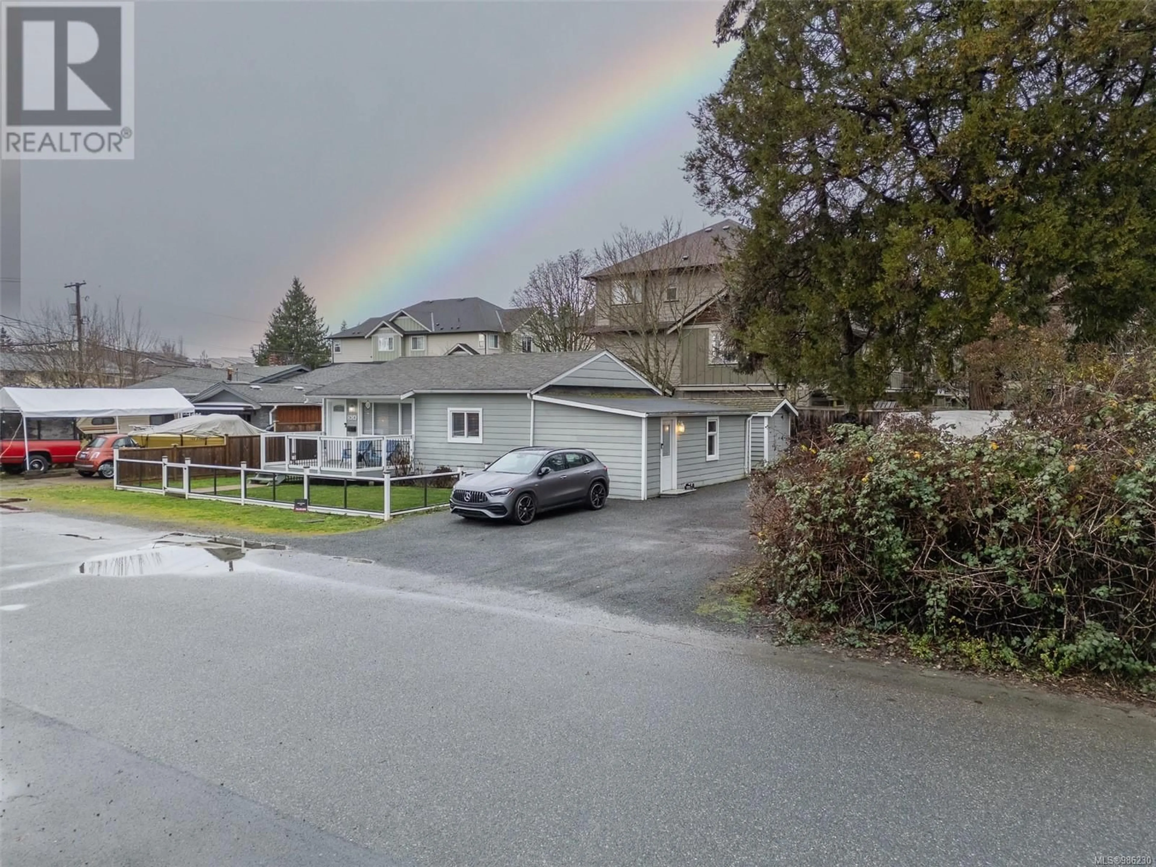 A pic from outside/outdoor area/front of a property/back of a property/a pic from drone, street for 2638 Sunderland Rd, Langford British Columbia V9B3W3