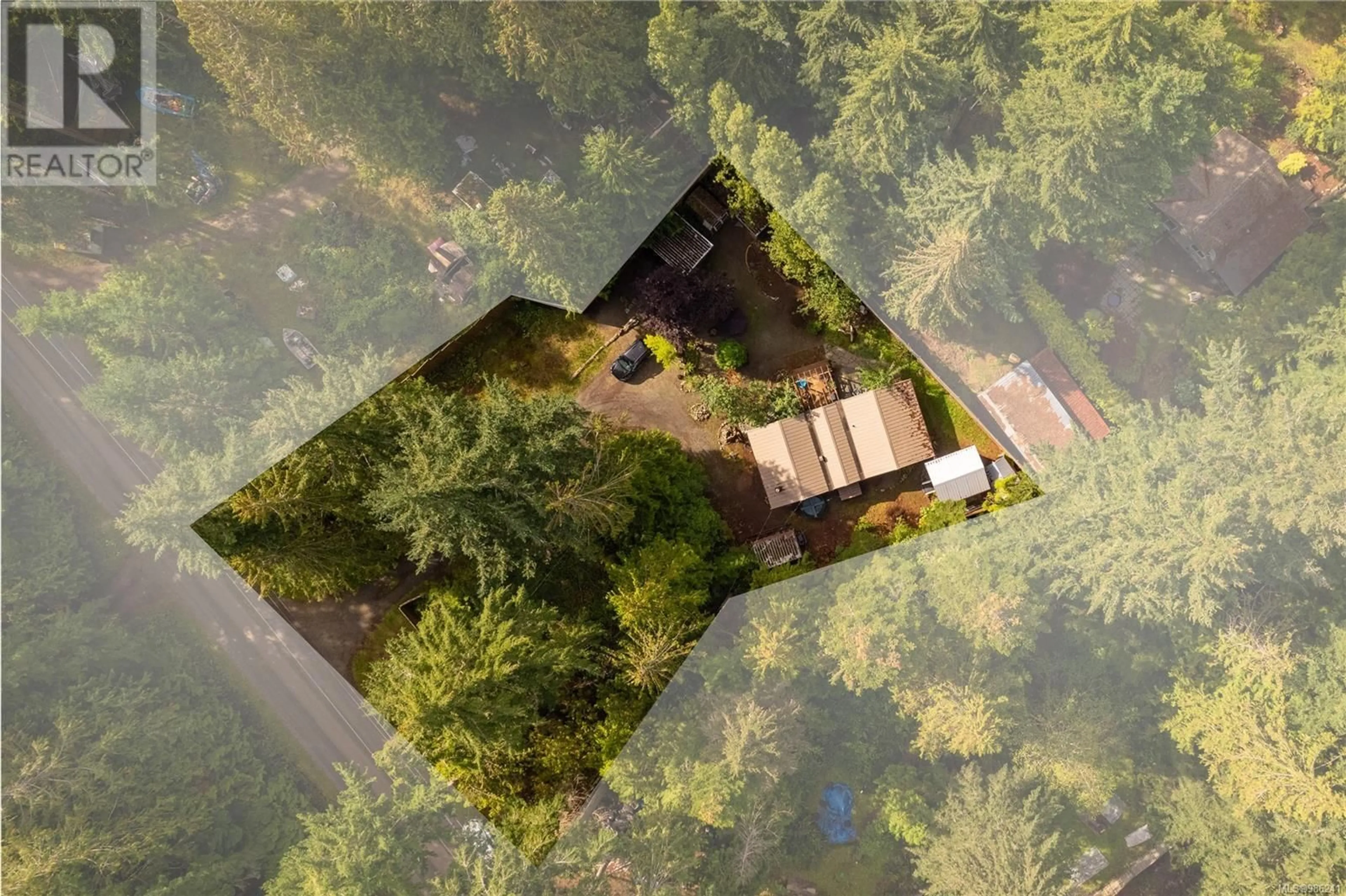 A pic from outside/outdoor area/front of a property/back of a property/a pic from drone, forest/trees view for 379 Hemlock Ave, Gabriola Island British Columbia V0R1X1