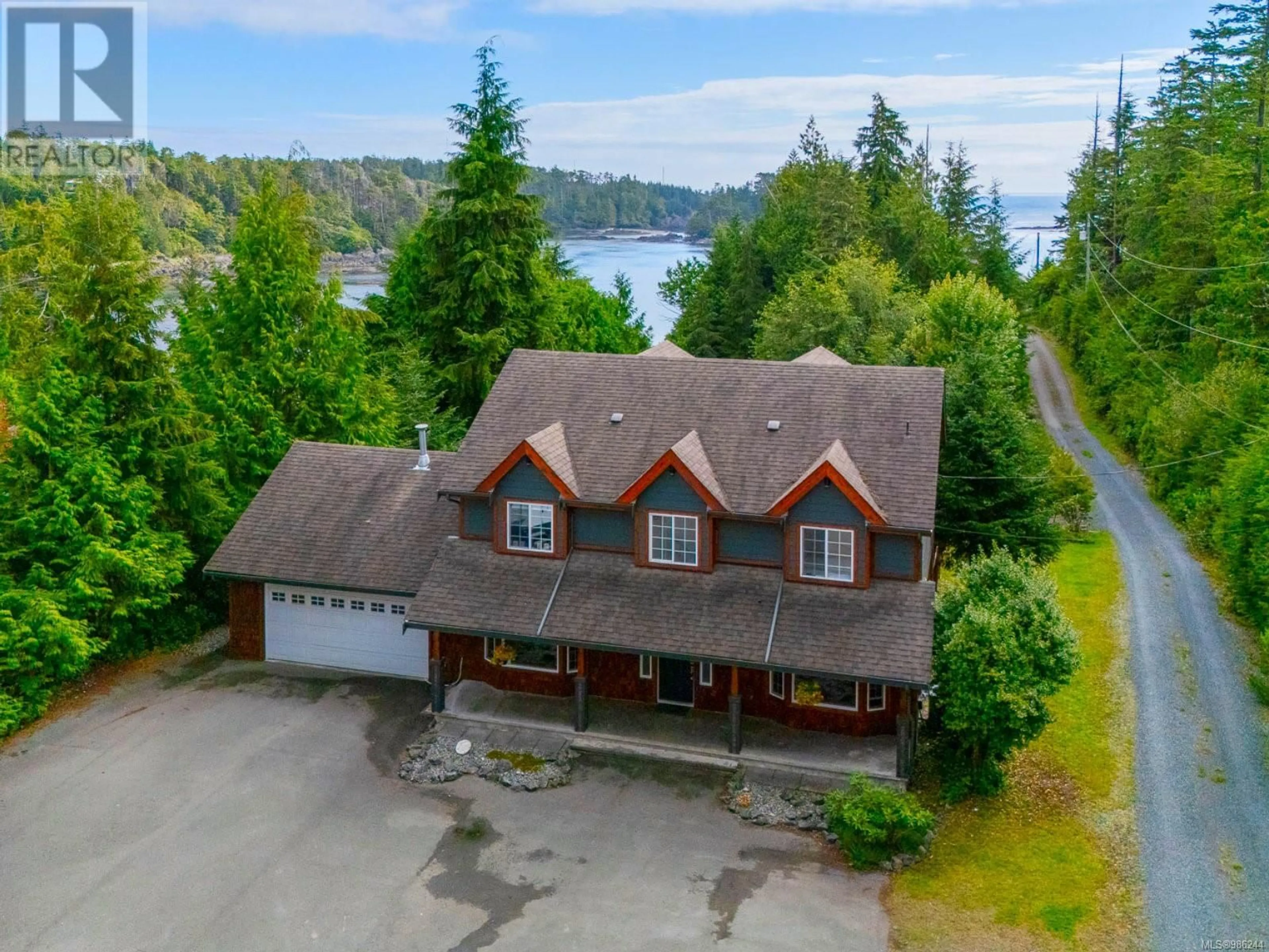 A pic from outside/outdoor area/front of a property/back of a property/a pic from drone, water/lake/river/ocean view for 398 Marine Dr, Ucluelet British Columbia V0R3A0