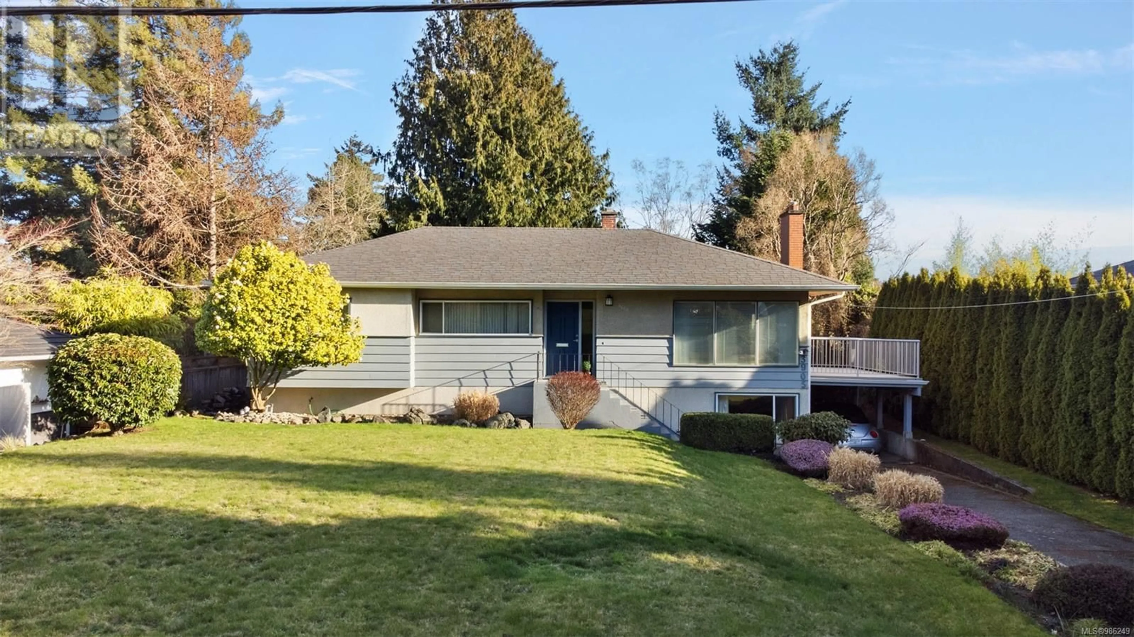 Home with vinyl exterior material, street for 3905 ROWLEY ROAD, Saanich British Columbia V8N4C3