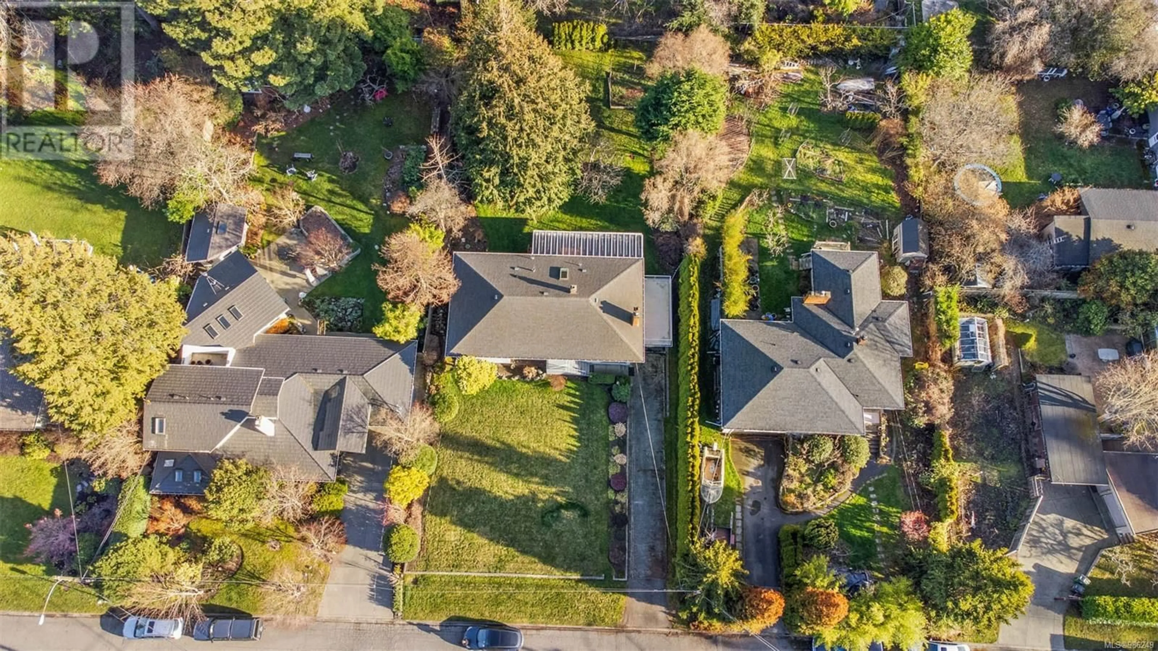 A pic from outside/outdoor area/front of a property/back of a property/a pic from drone, street for 3905 ROWLEY ROAD, Saanich British Columbia V8N4C3