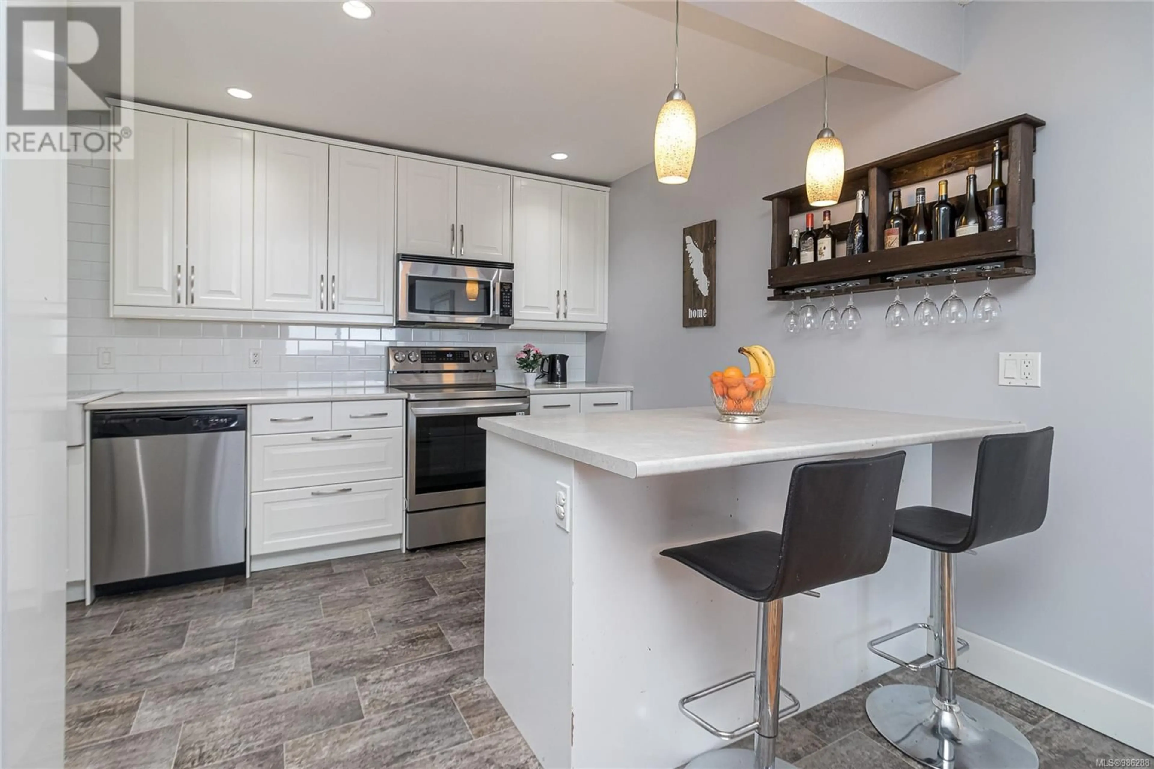 Open concept kitchen, ceramic/tile floor for 1146 Kiwi Rd, Langford British Columbia V9B5C1