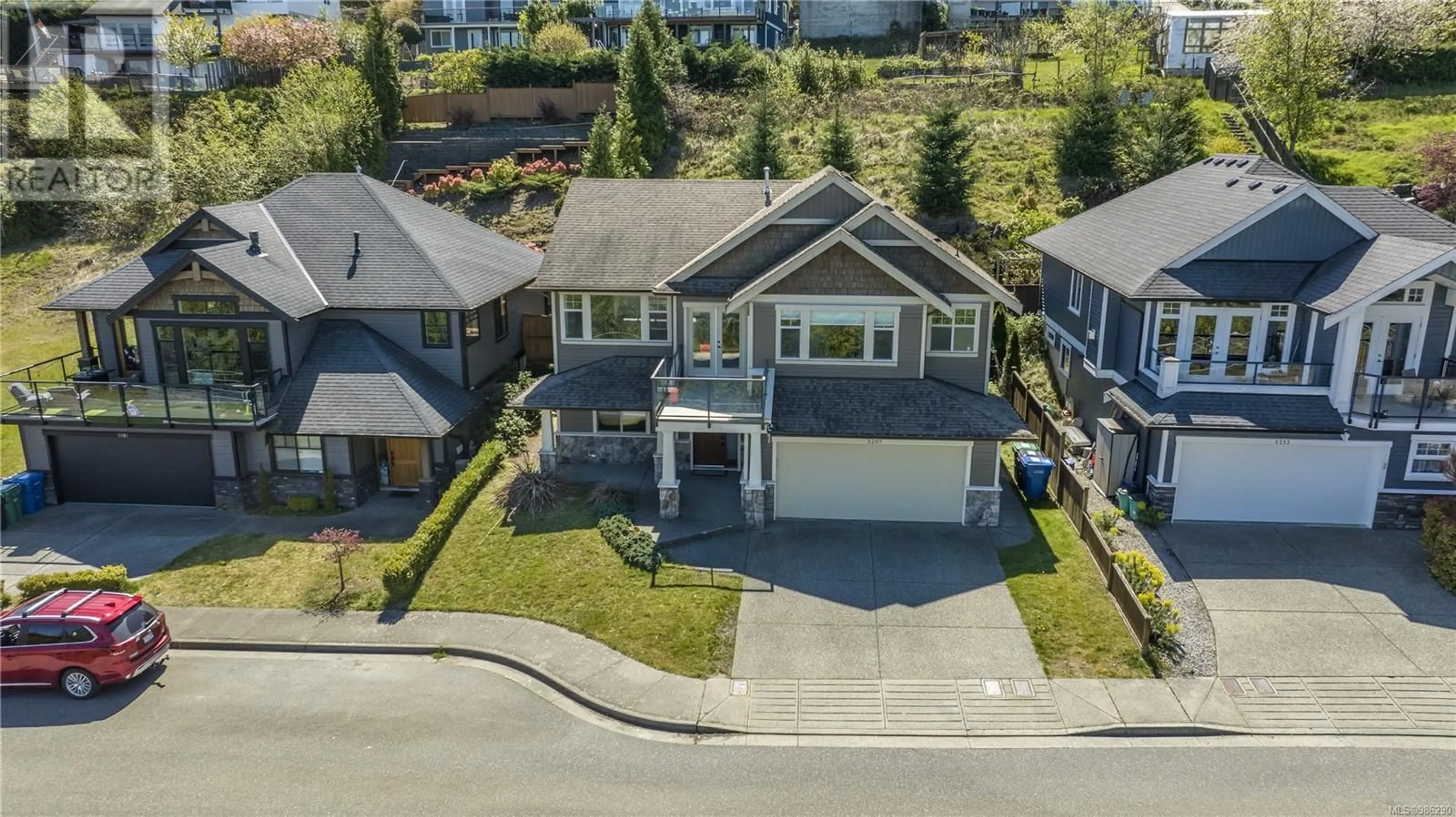 A pic from outside/outdoor area/front of a property/back of a property/a pic from drone, street for 5207 Dewar Rd, Nanaimo British Columbia V9T6T3