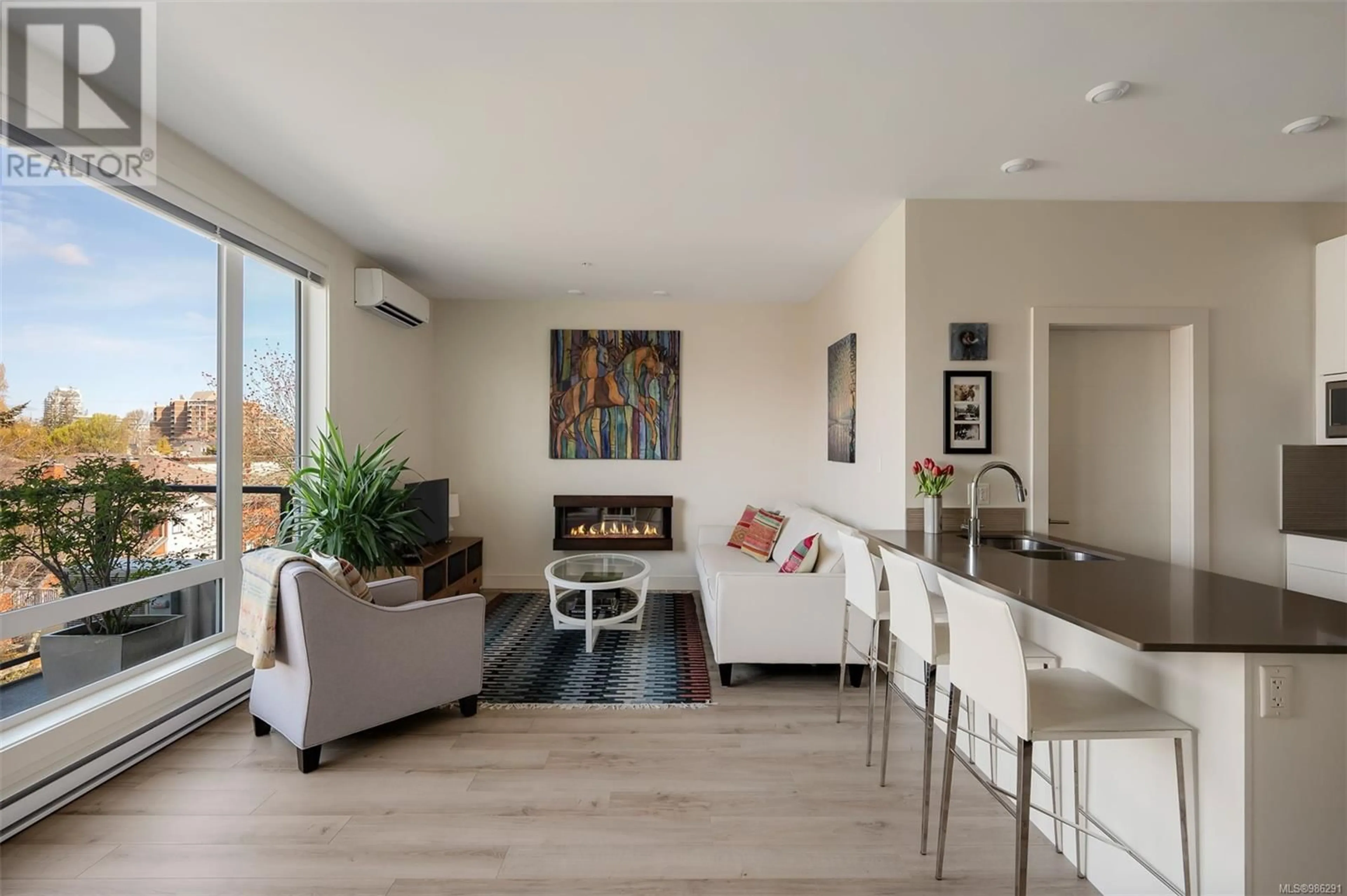 Living room with furniture, wood/laminate floor for 402 300 Michigan St, Victoria British Columbia V8V1R5