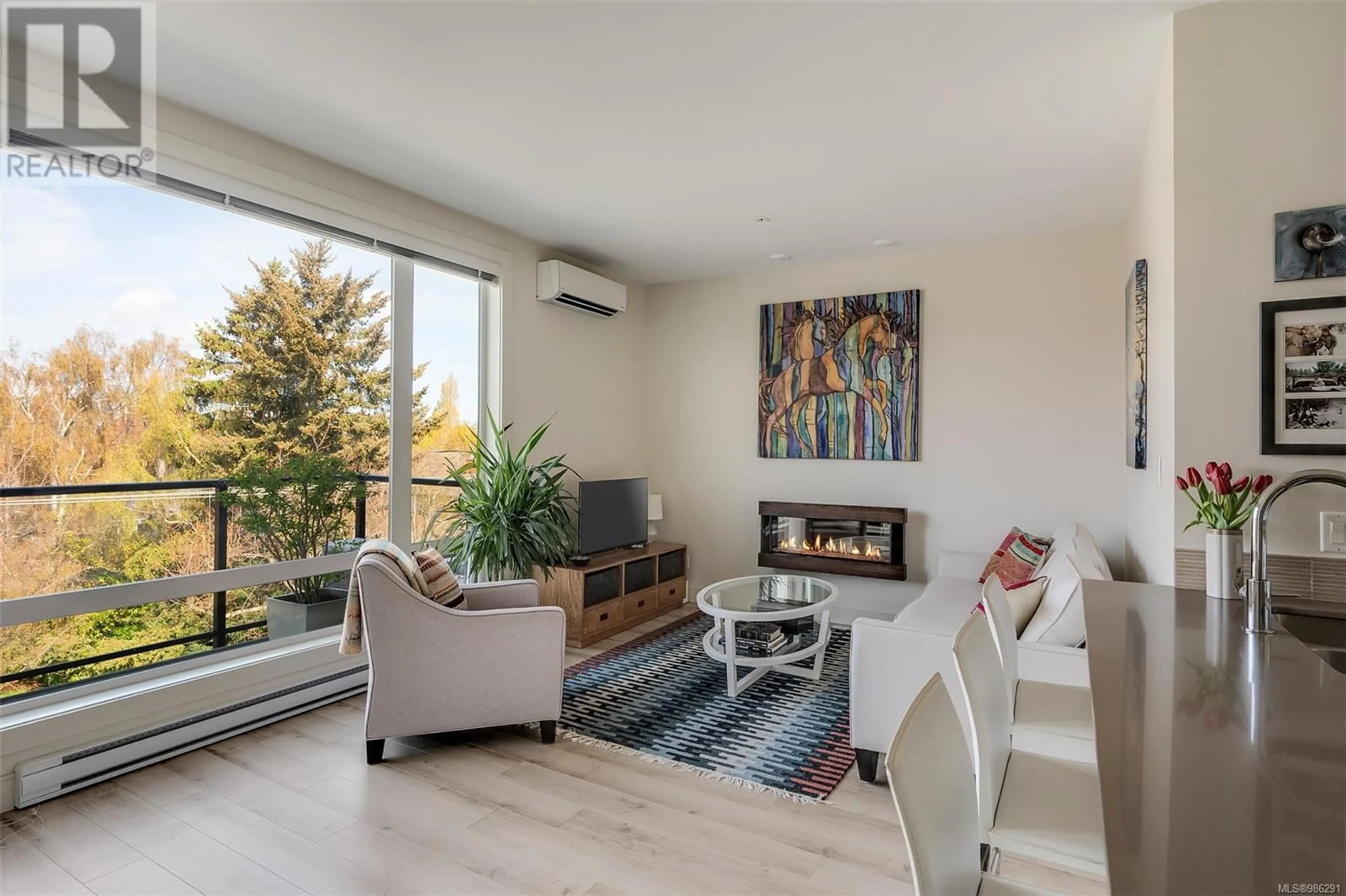 Living room with furniture, wood/laminate floor for 402 300 Michigan St, Victoria British Columbia V8V1R5