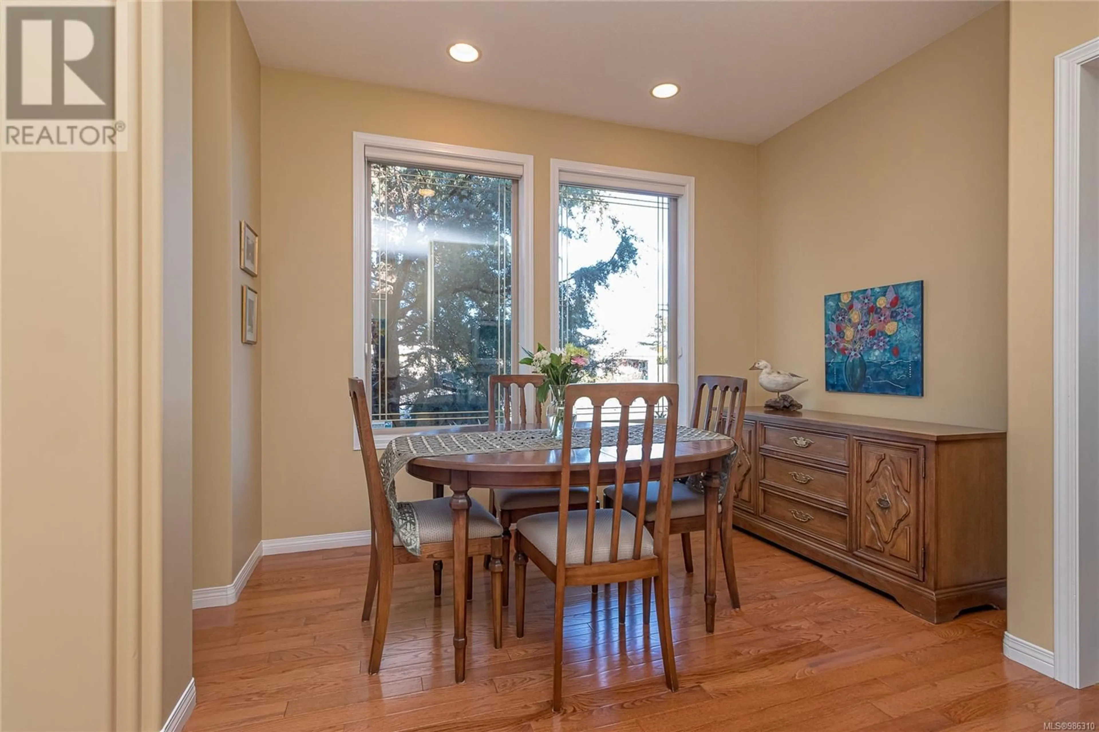 Dining room, wood/laminate floor for 1110 Ormonde Rd, Qualicum Beach British Columbia V9K2P2