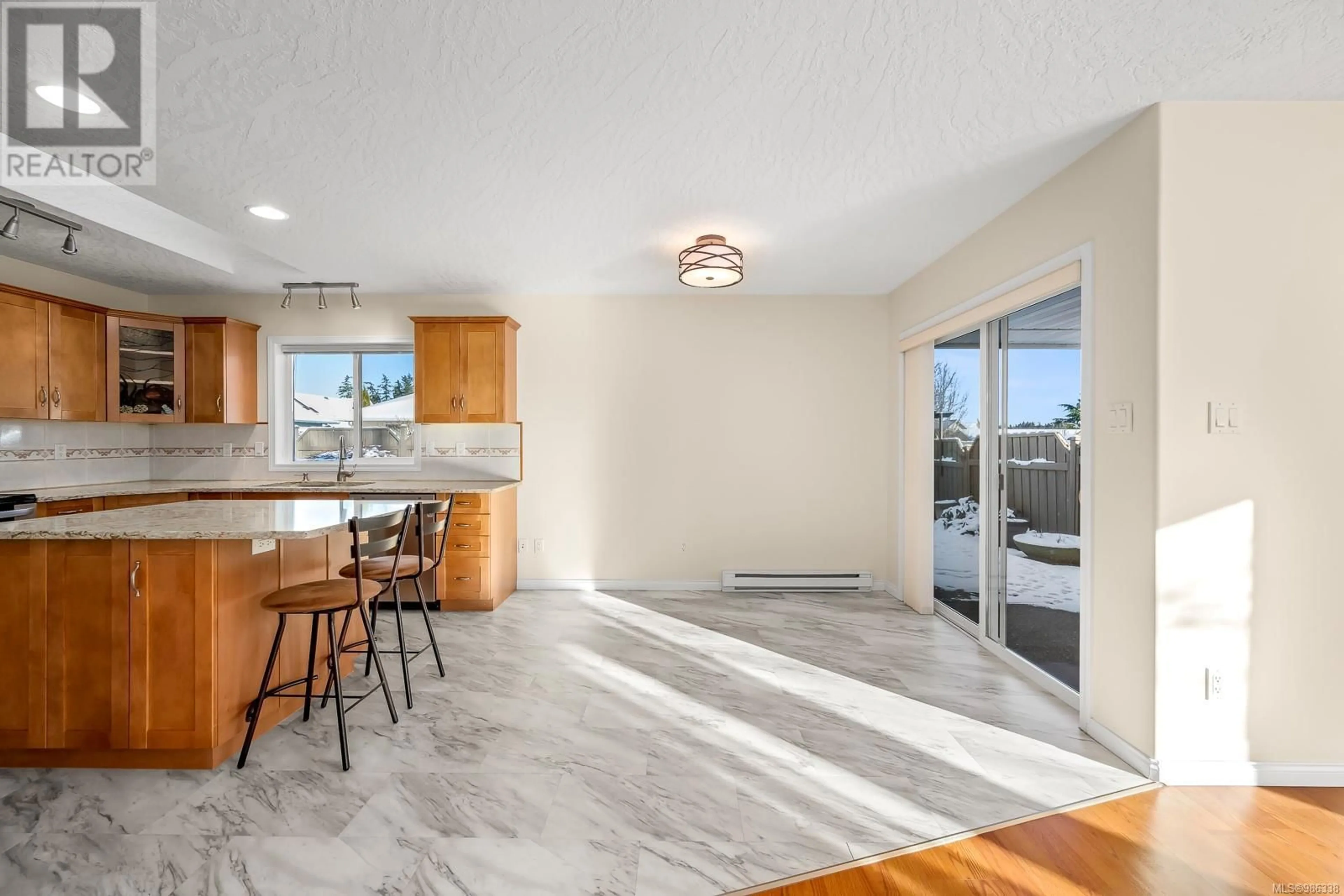 Open concept kitchen, ceramic/tile floor for 555 Church St, Comox British Columbia V9M4G5