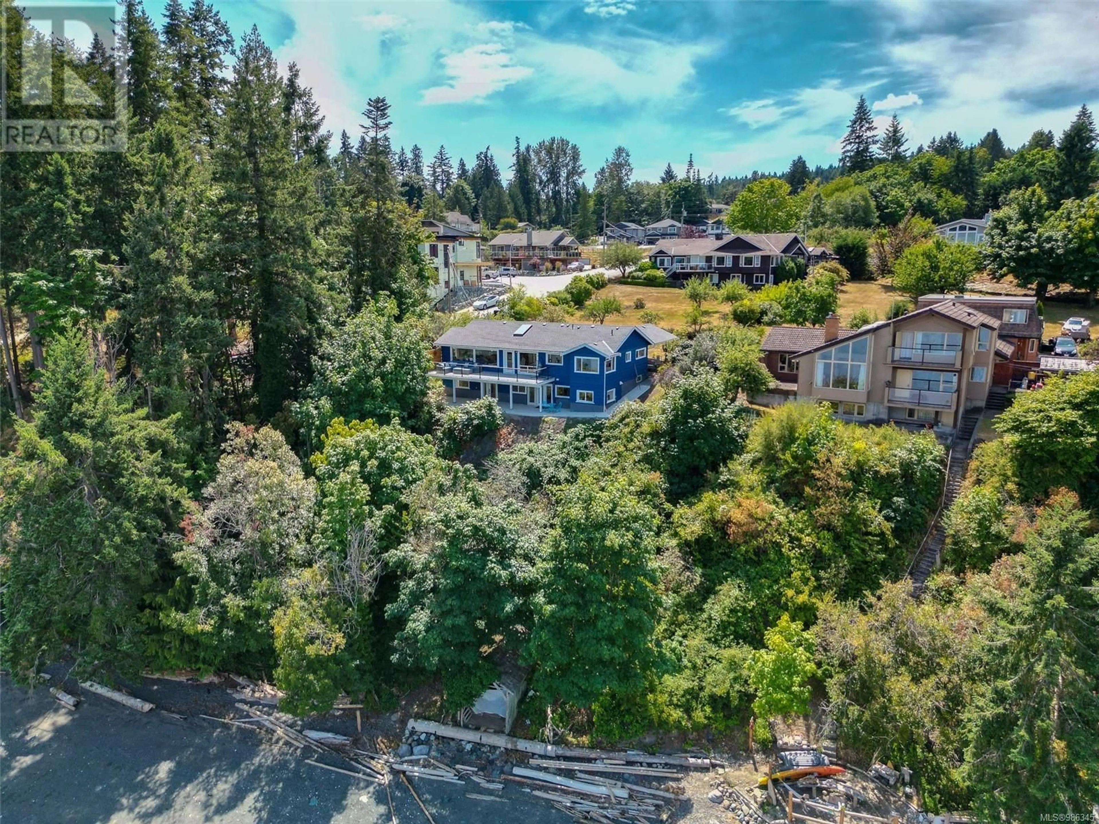 A pic from outside/outdoor area/front of a property/back of a property/a pic from drone, mountain view for 3187 Malcolm Rd, Chemainus British Columbia V0R1K2