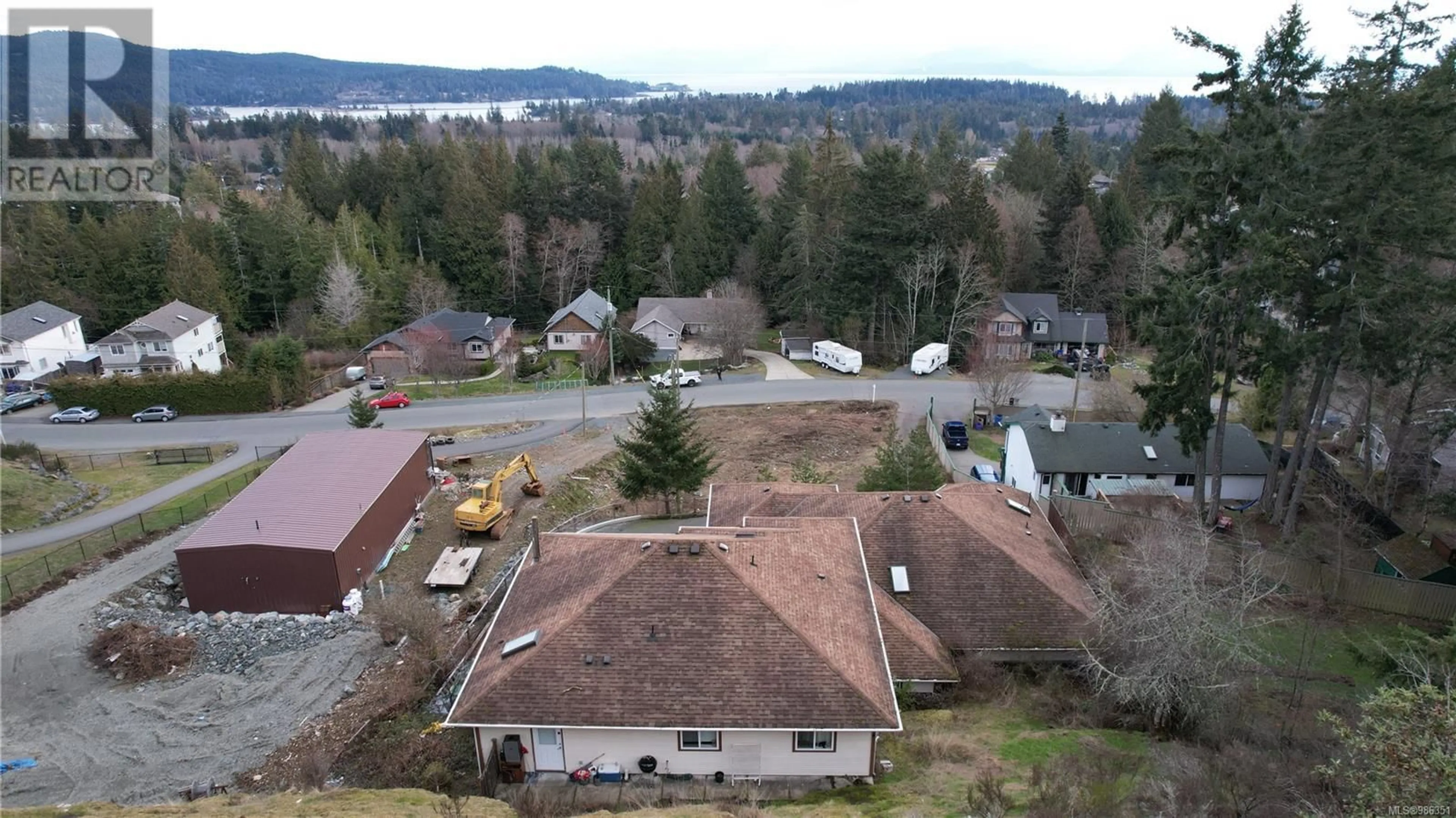 A pic from outside/outdoor area/front of a property/back of a property/a pic from drone, unknown for 7074/7076 Maple Park Terr, Sooke British Columbia V9Z0N2