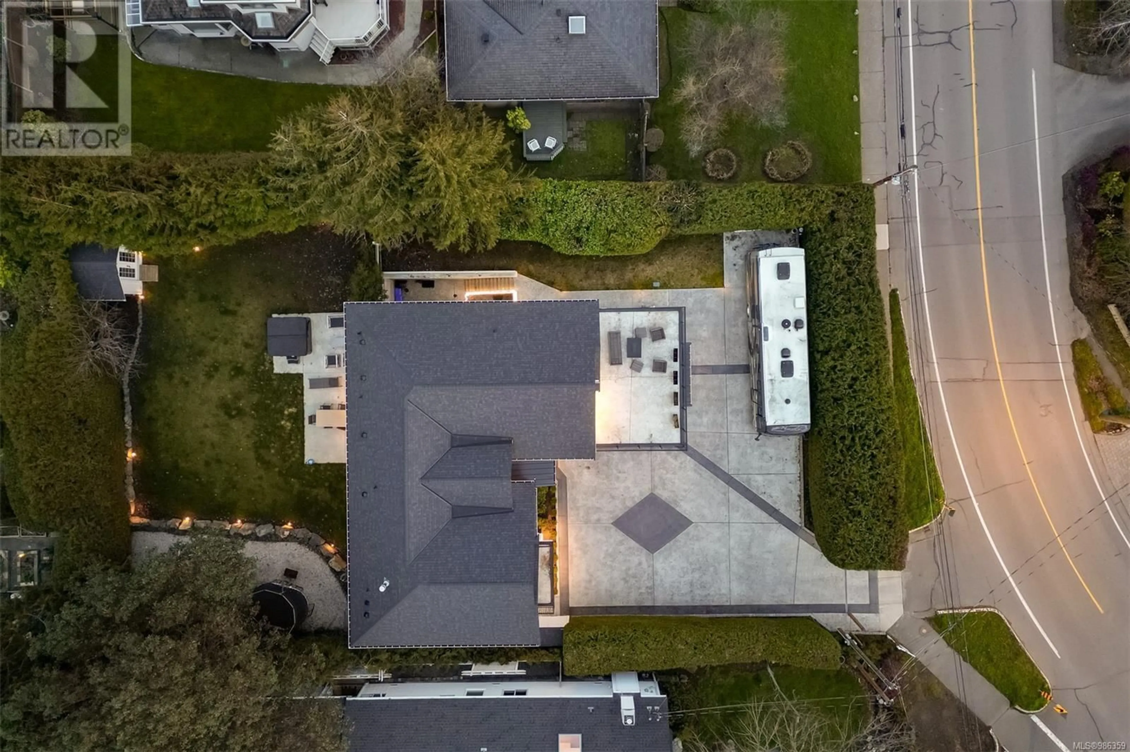 A pic from outside/outdoor area/front of a property/back of a property/a pic from drone, street for 3880 Cadboro Bay Rd, Saanich British Columbia V8N4G5