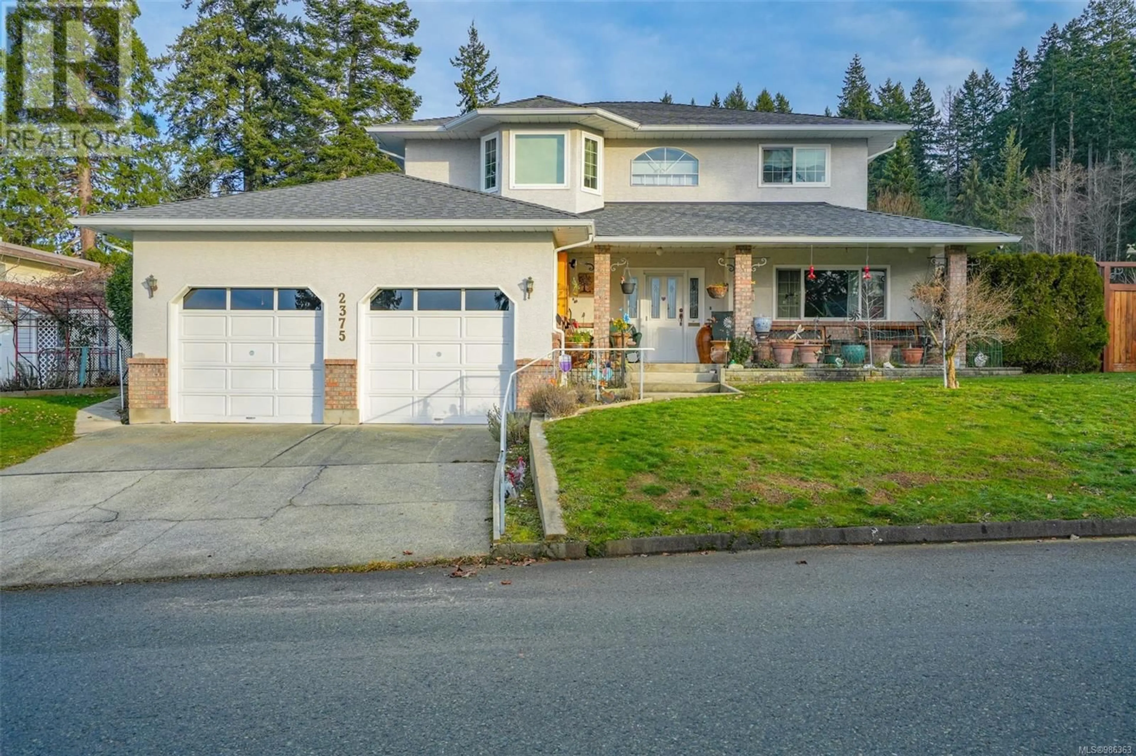 Home with vinyl exterior material, street for 2375 14th Ave, Port Alberni British Columbia V9Y2Y3