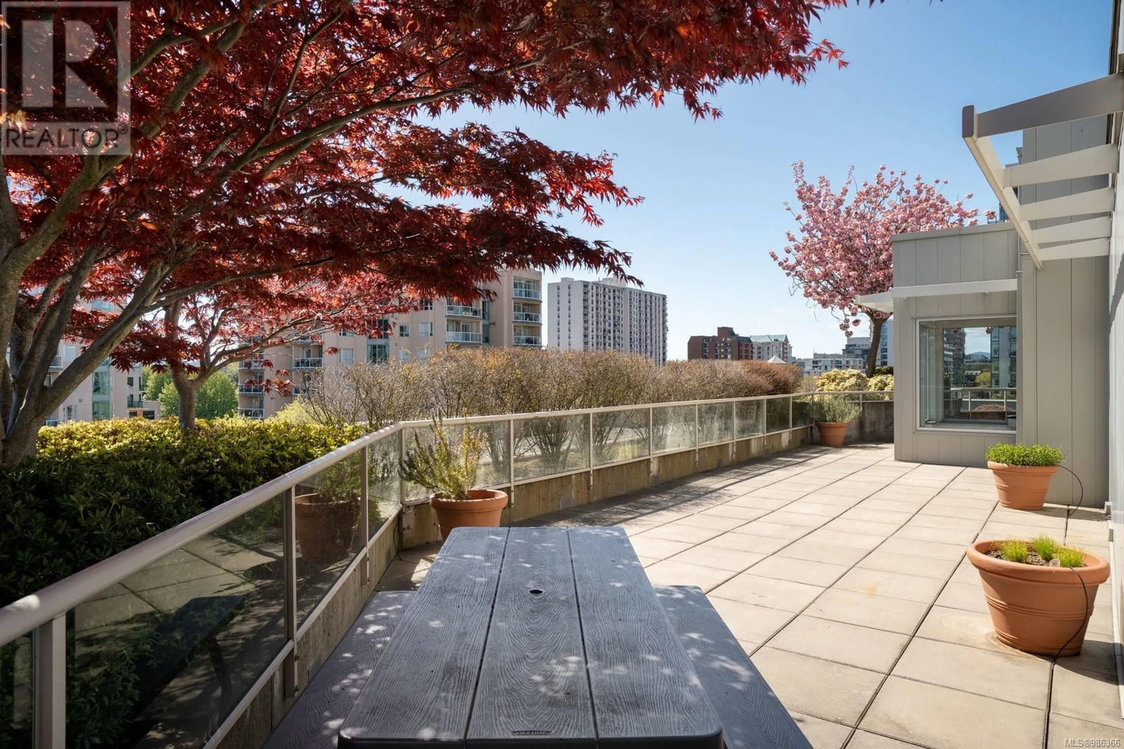 Patio, city buildings view from balcony for 302 1030 Yates St, Victoria British Columbia V8V5A7