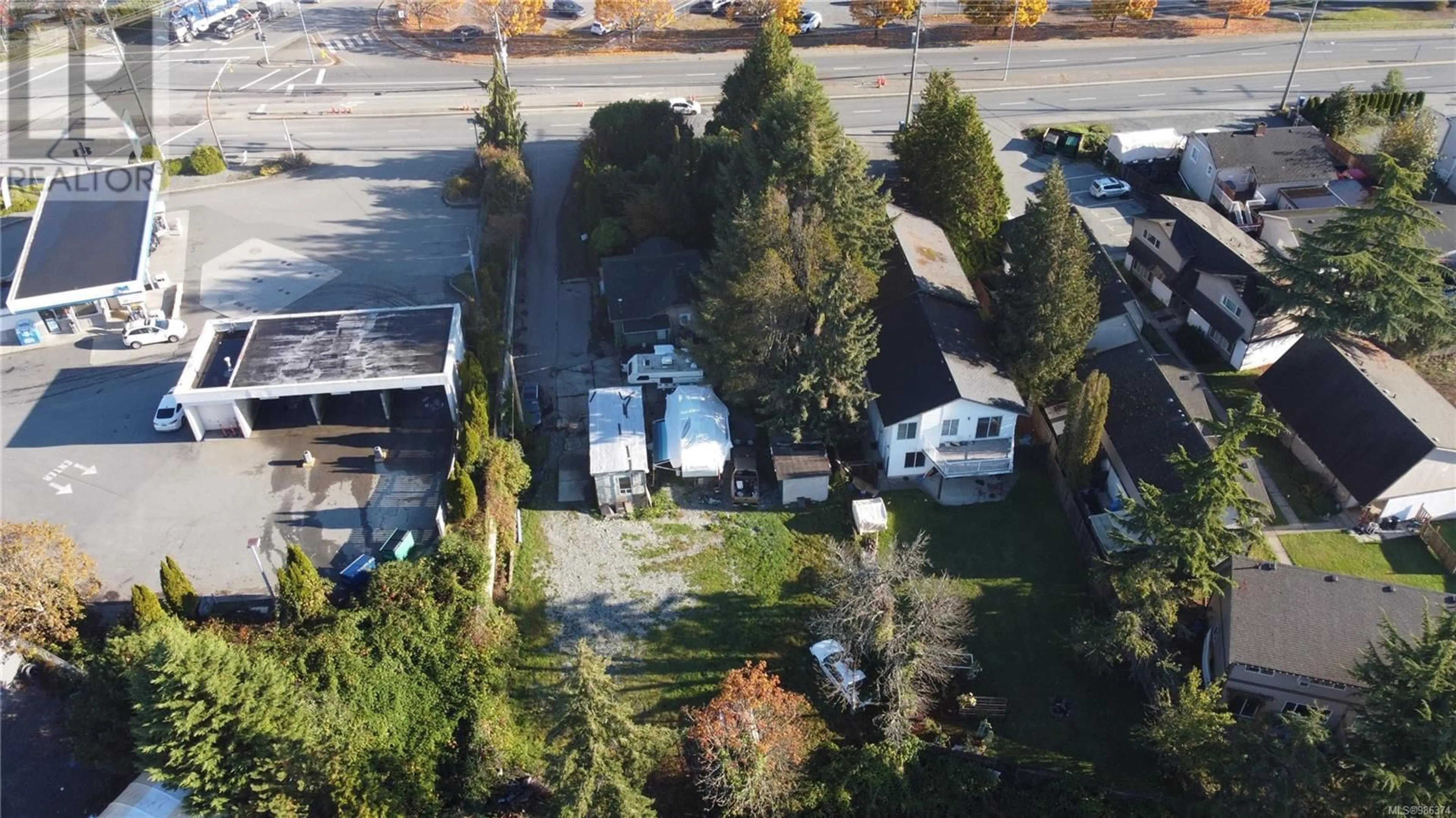 A pic from outside/outdoor area/front of a property/back of a property/a pic from drone, street for 1641 Bowen Rd, Nanaimo British Columbia V9S1C7