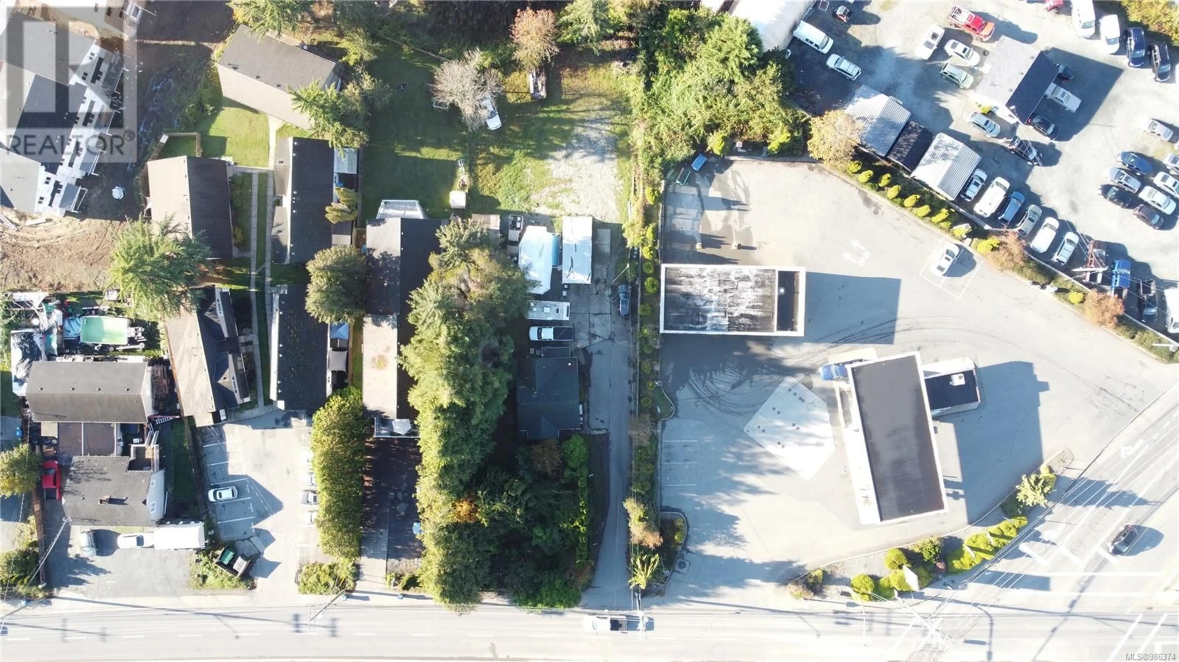 A pic from outside/outdoor area/front of a property/back of a property/a pic from drone, street for 1641 Bowen Rd, Nanaimo British Columbia V9S1C7