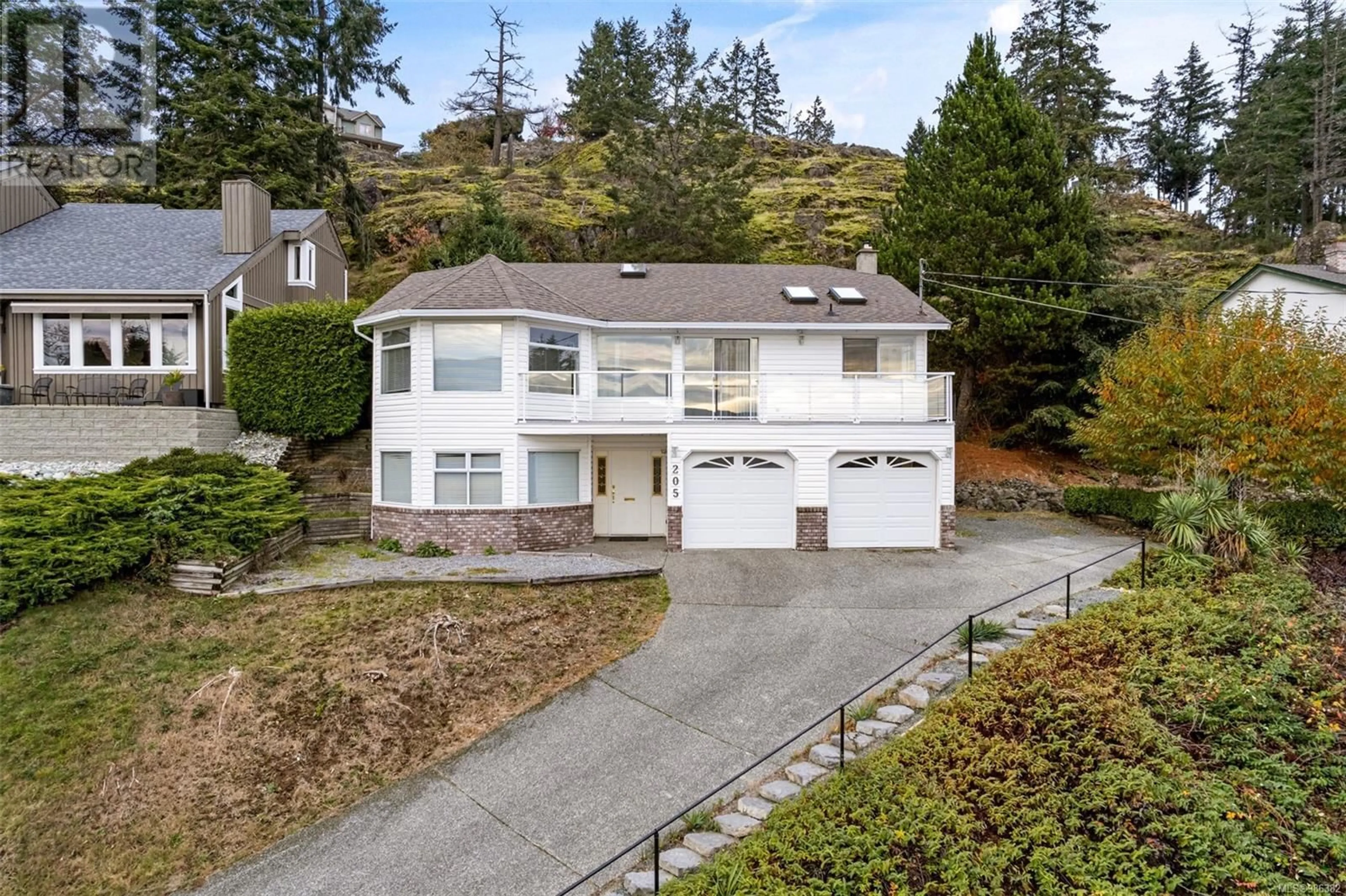 A pic from outside/outdoor area/front of a property/back of a property/a pic from drone, street for 205 Prince John Way, Nanaimo British Columbia V9T4L4