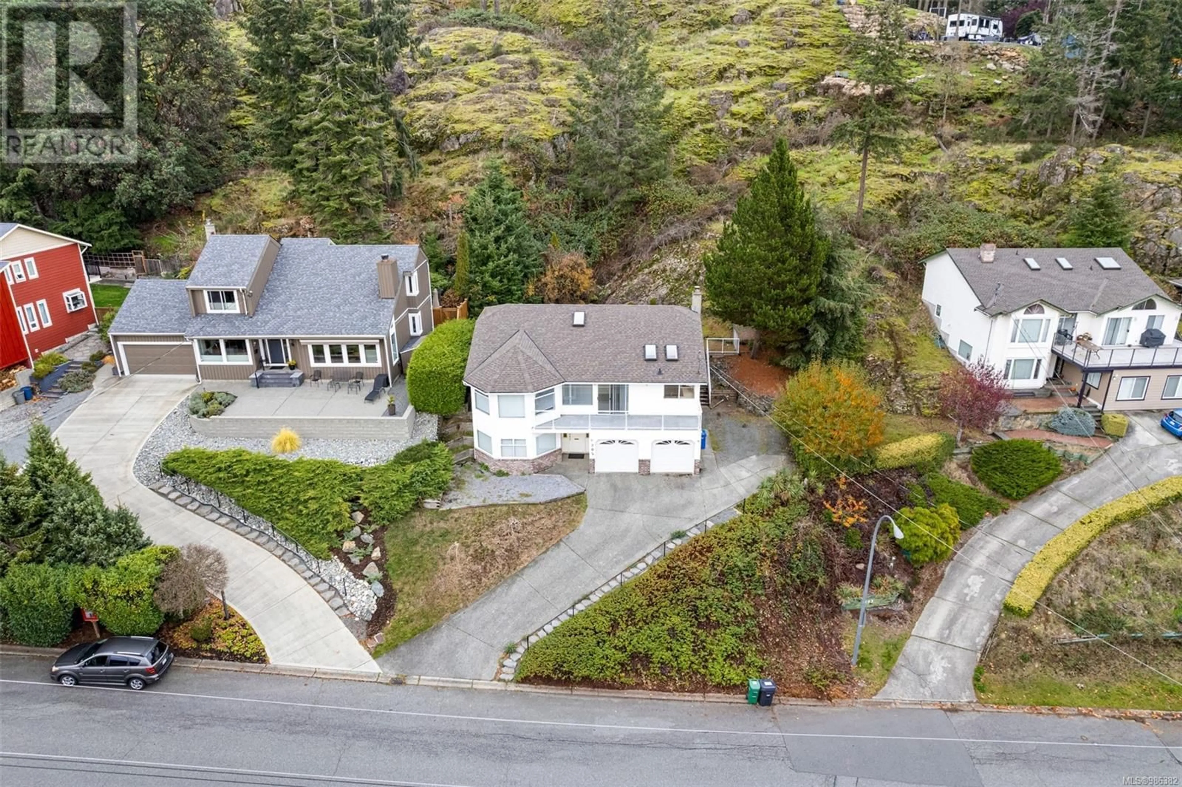 A pic from outside/outdoor area/front of a property/back of a property/a pic from drone, street for 205 Prince John Way, Nanaimo British Columbia V9T4L4