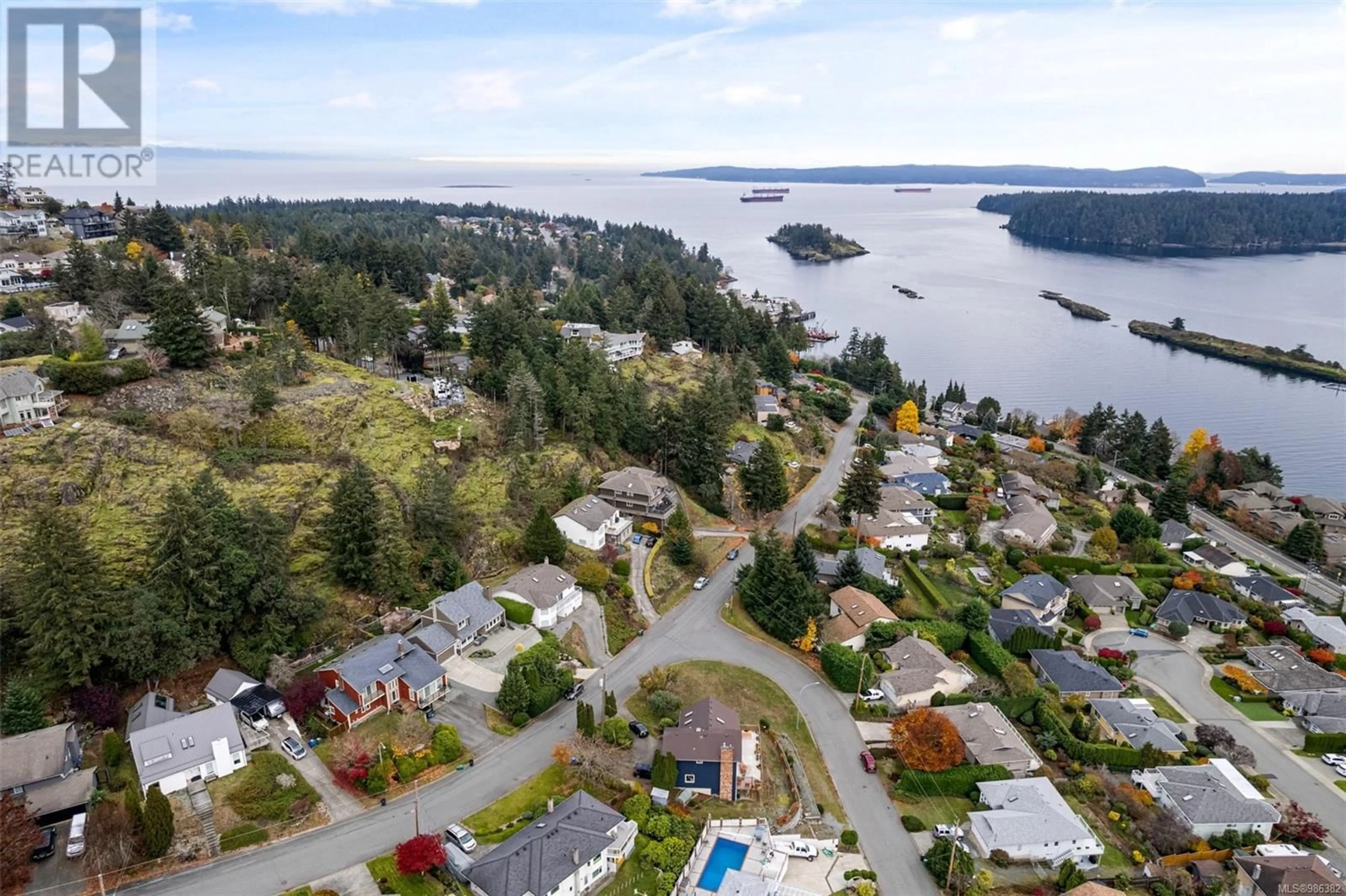 A pic from outside/outdoor area/front of a property/back of a property/a pic from drone, water/lake/river/ocean view for 205 Prince John Way, Nanaimo British Columbia V9T4L4