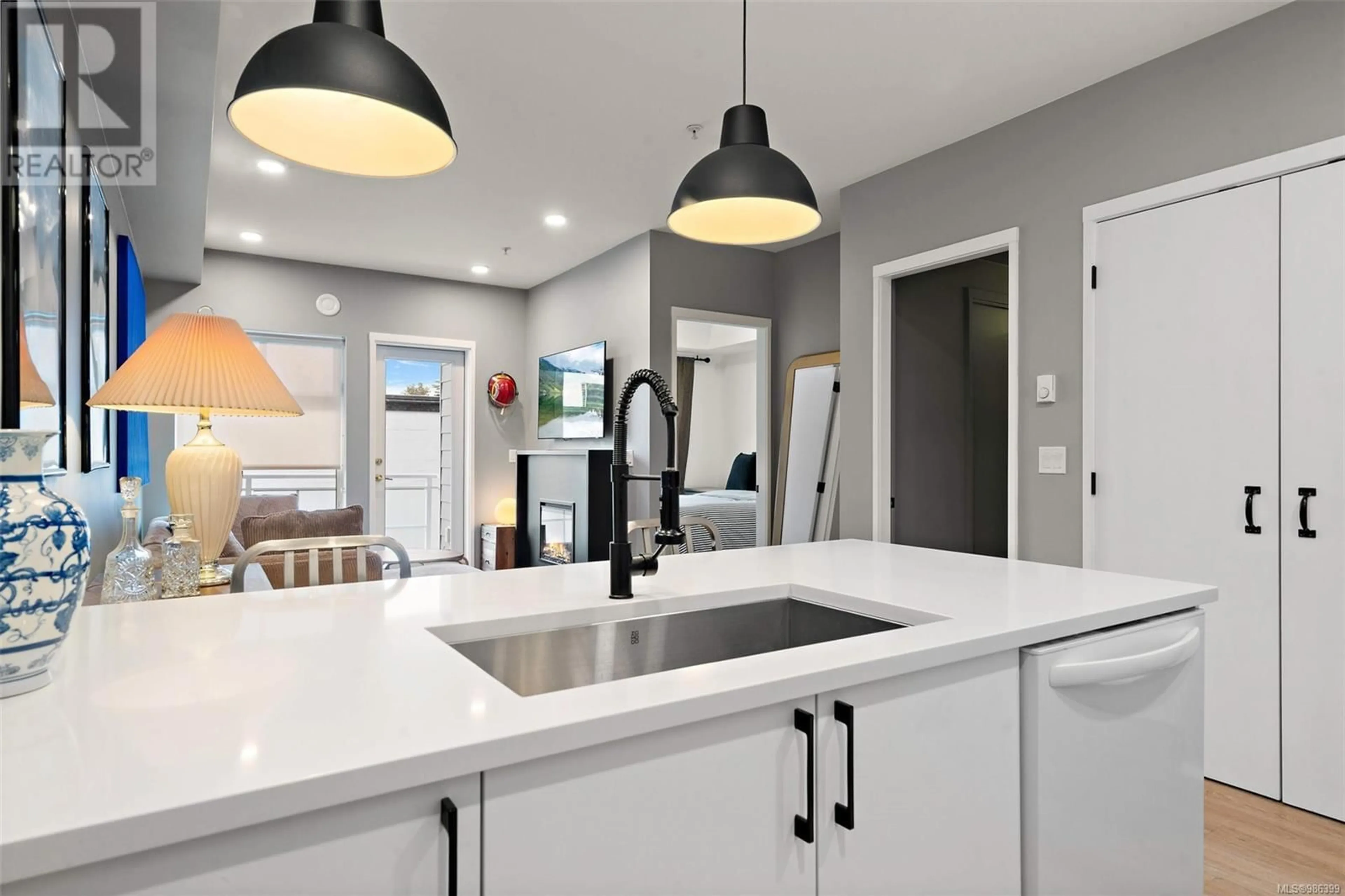 Open concept kitchen, unknown for 203 2348 Beacon Ave, Sidney British Columbia V8L1X3