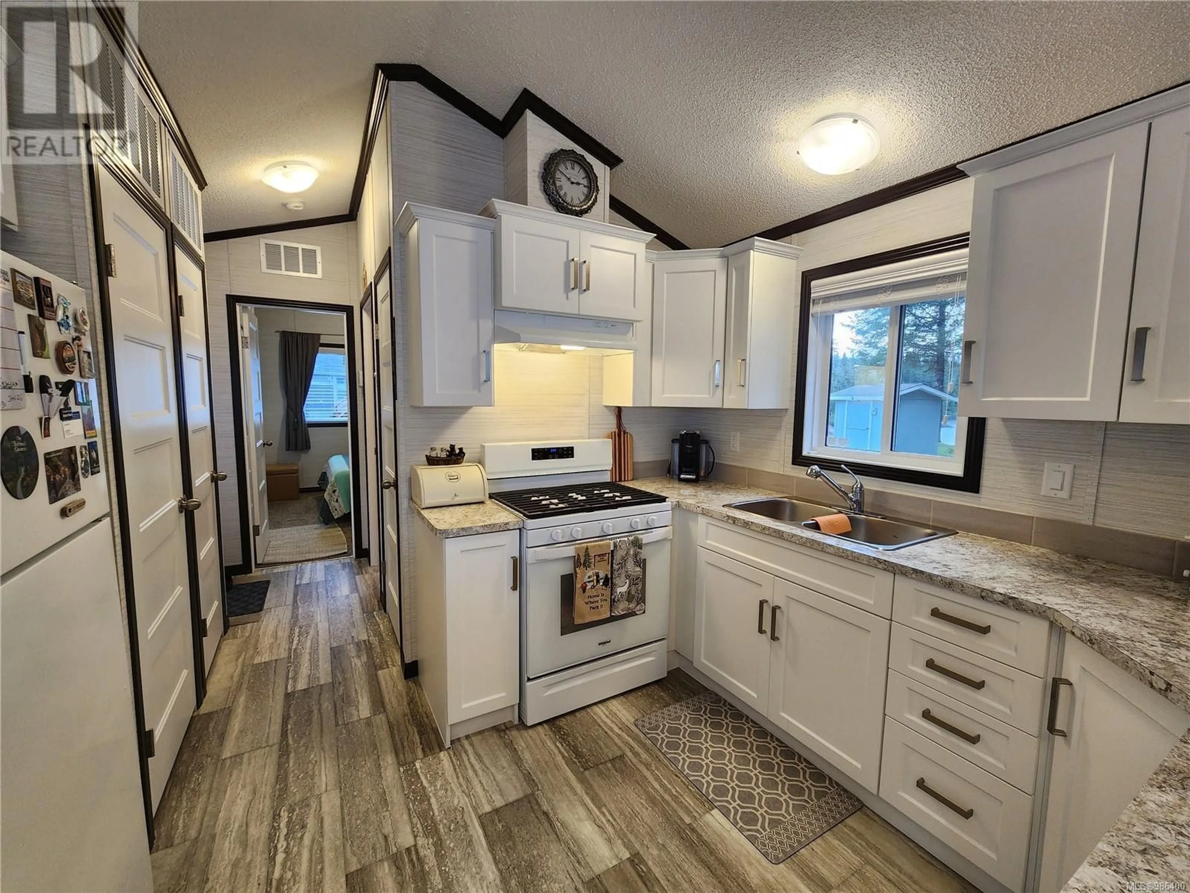 Open concept kitchen, unknown for 5 1 ALDER BAY Rd, Port McNeill British Columbia V0N2R0