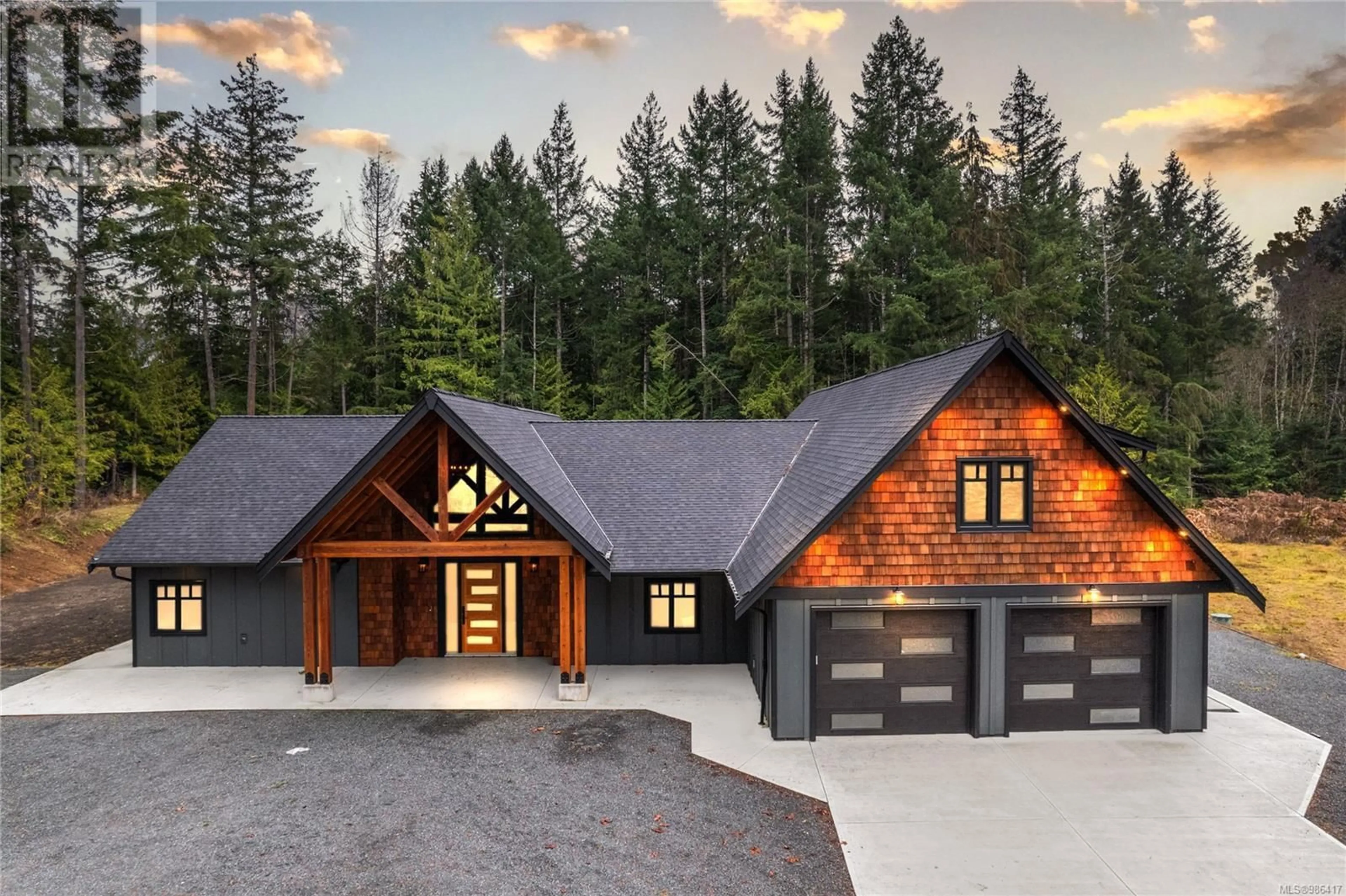 Home with brick exterior material, mountain view for 1940 TIMBERLAKE PLACE, Qualicum Beach British Columbia V9K2R6