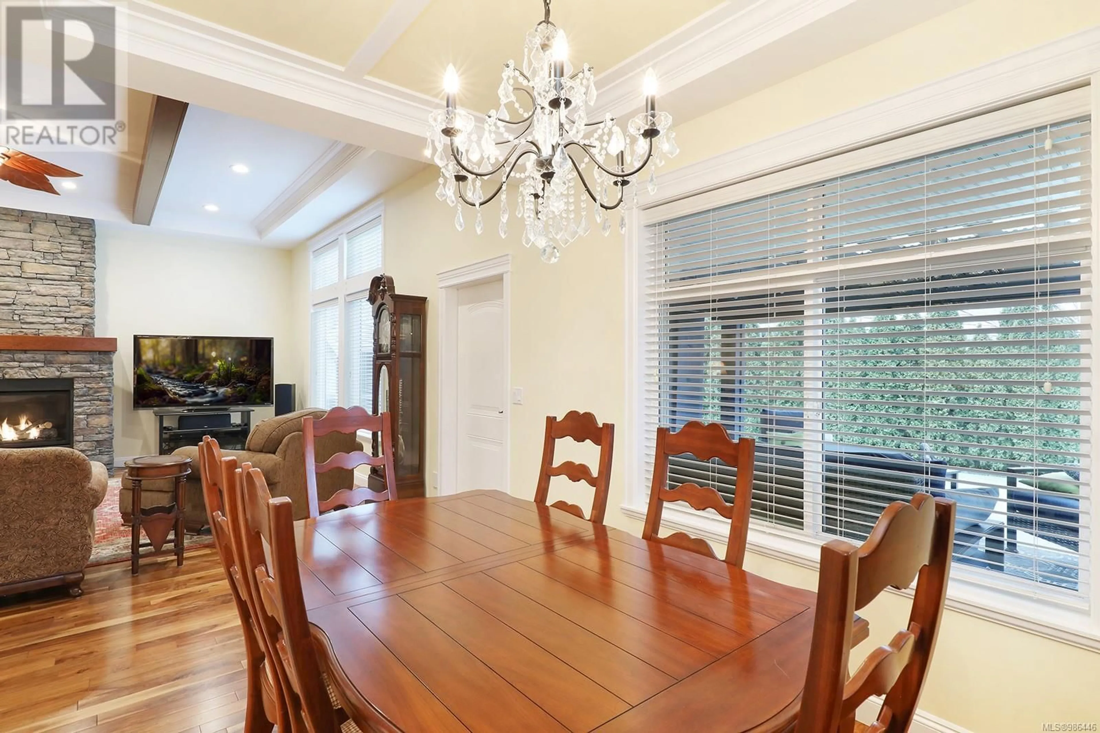 Dining room, wood/laminate floor for 1413 Crown Isle Dr, Courtenay British Columbia V9N4B1