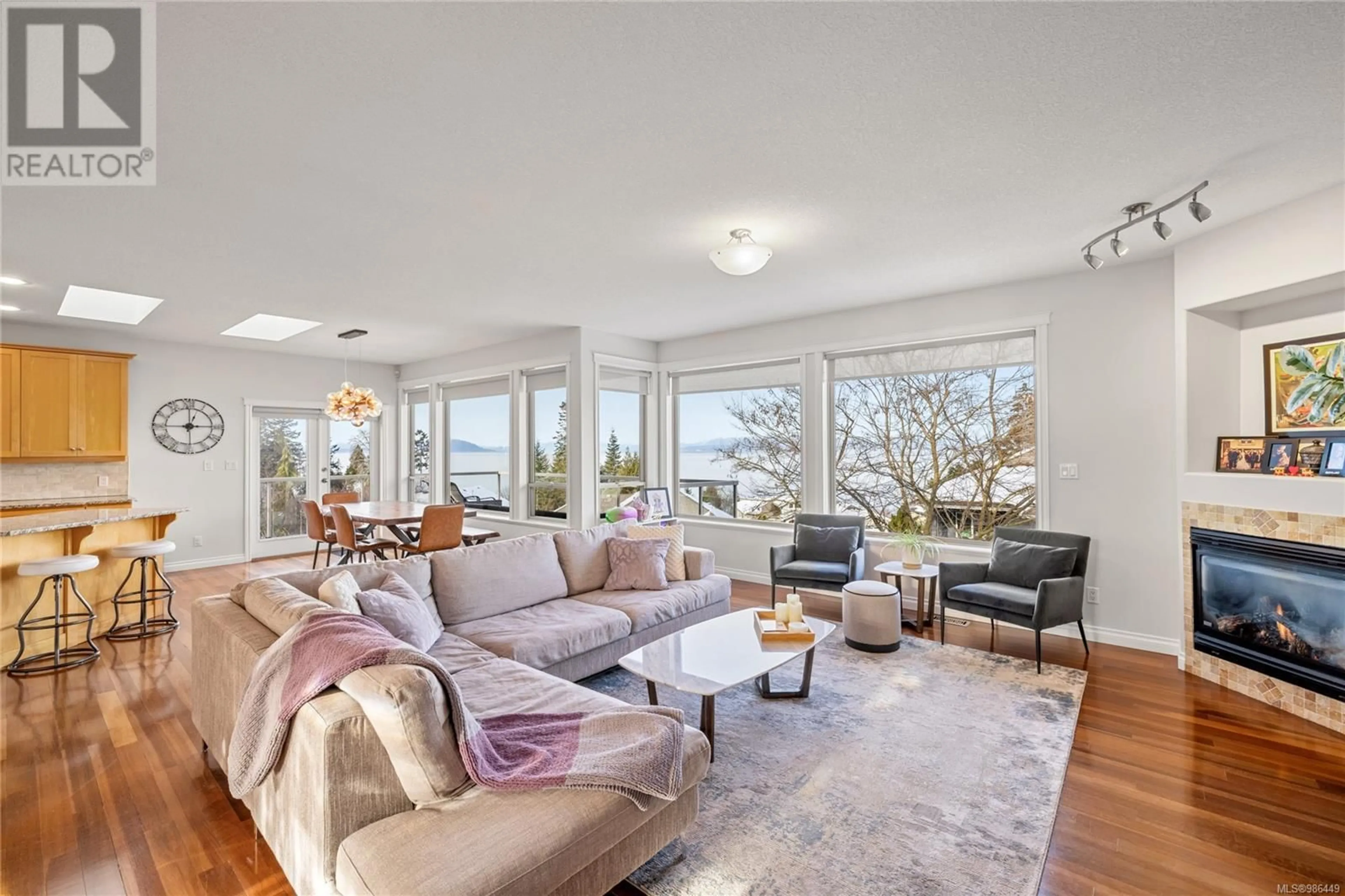Living room with furniture, unknown for 5684 MUGGIES WAY, Nanaimo British Columbia V9V1W2