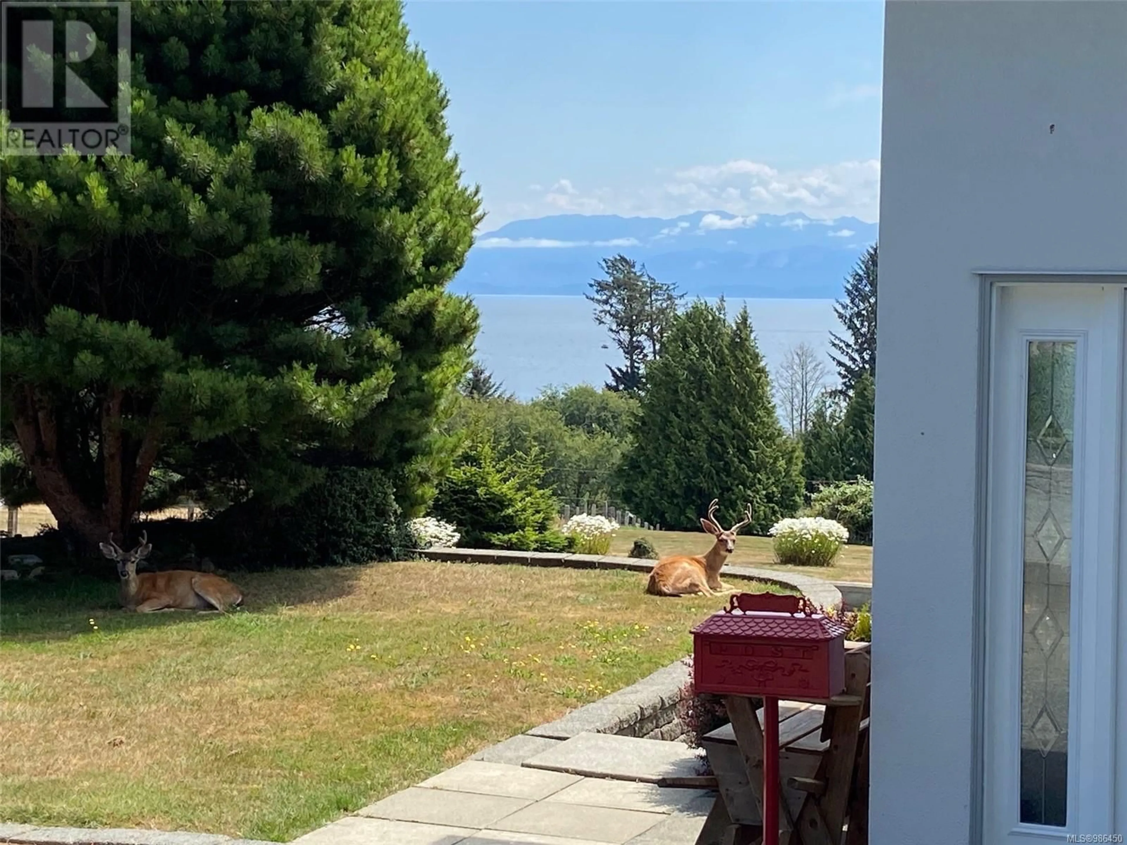 A pic from outside/outdoor area/front of a property/back of a property/a pic from drone, water/lake/river/ocean view for 4690 OTTER POINT PLACE, Sooke British Columbia V9Z0K6