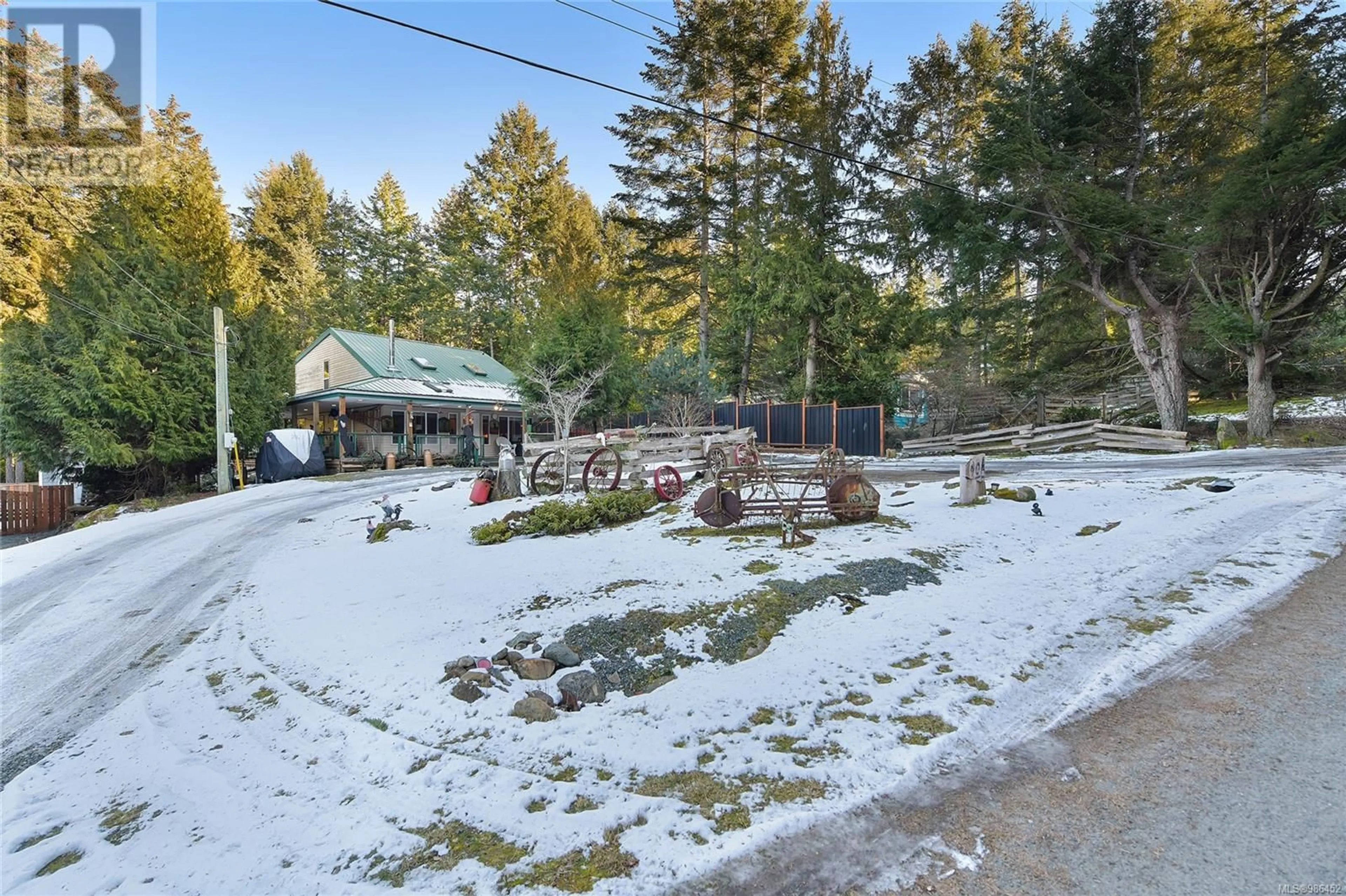 A pic from outside/outdoor area/front of a property/back of a property/a pic from drone, unknown for 714 CHARTER ROAD, Mayne Island British Columbia V0N2J1