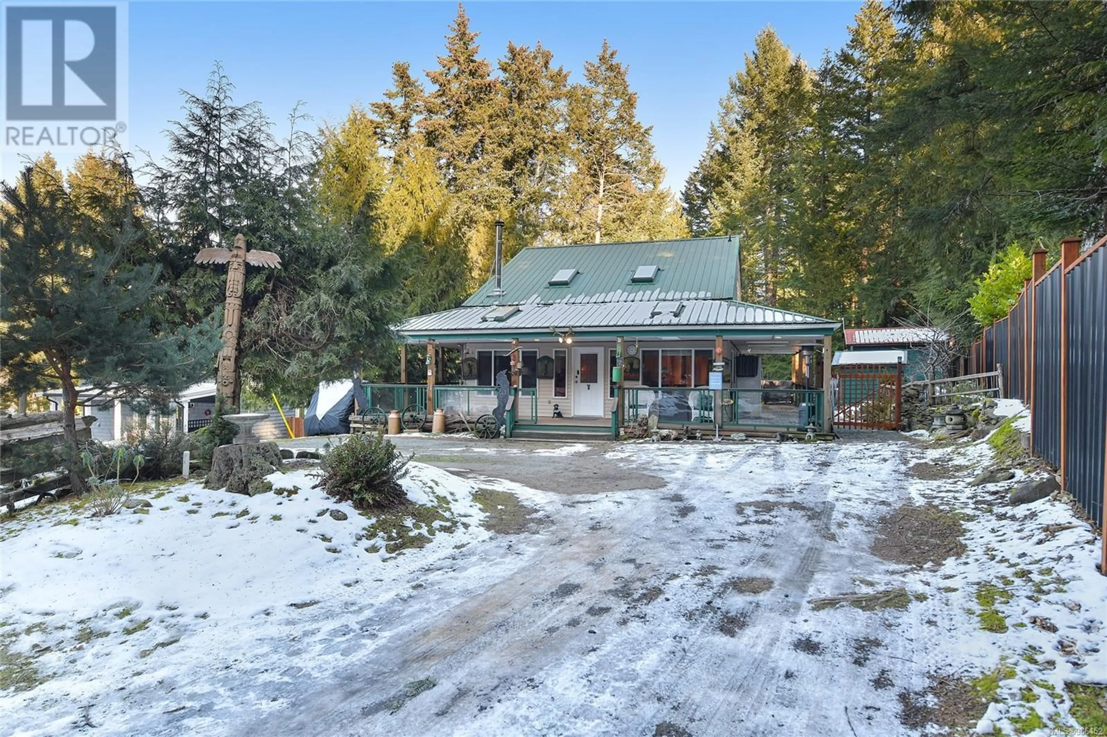 A pic from outside/outdoor area/front of a property/back of a property/a pic from drone, unknown for 714 Charter Rd, Mayne Island British Columbia V0N2J1