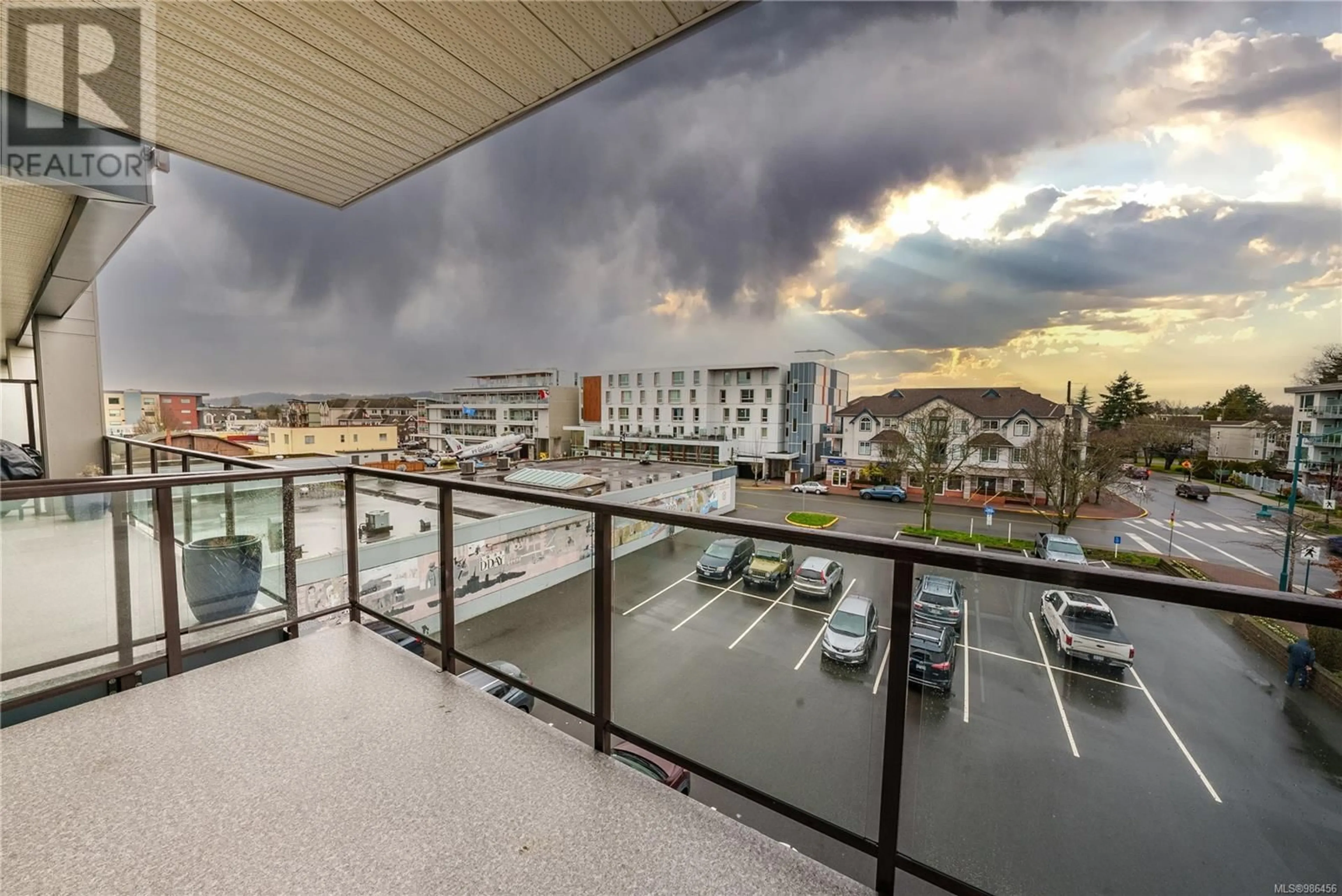 Balcony in the apartment, city buildings view from balcony for 314 2461 Sidney Ave, Sidney British Columbia V8L1Y8