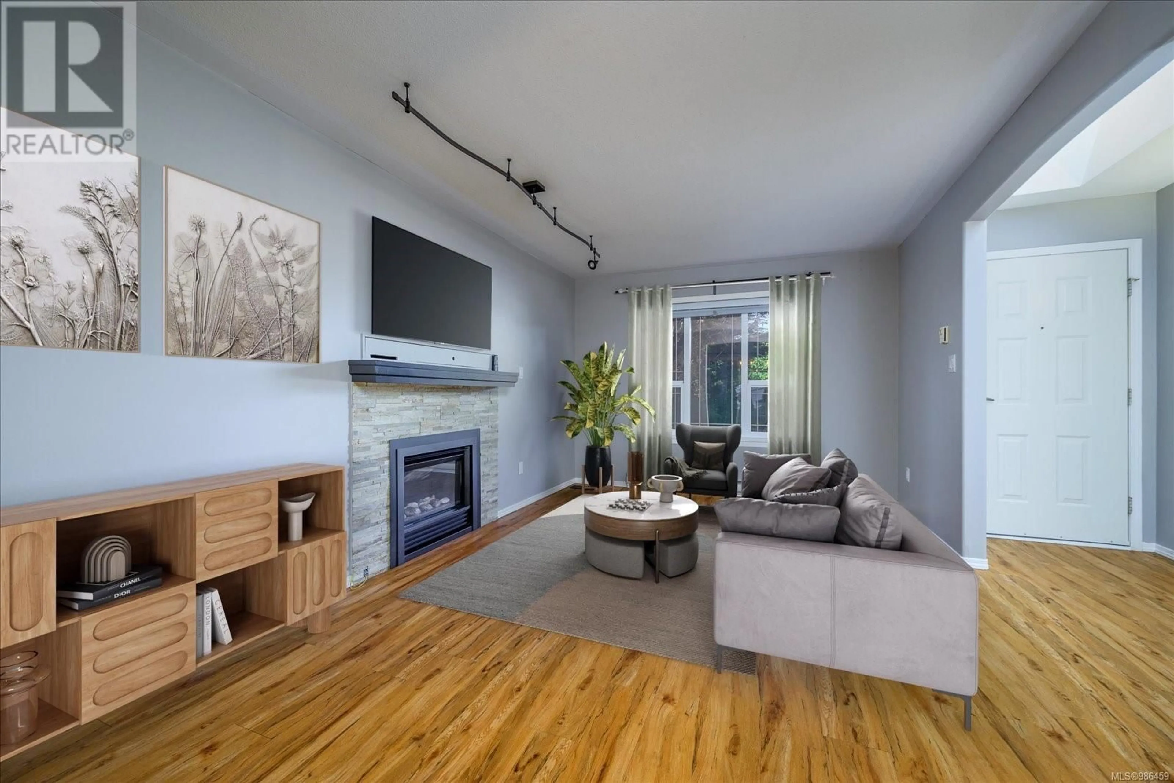 Living room with furniture, wood/laminate floor for 909 Brookfield Pl, Nanaimo British Columbia V9R6P4