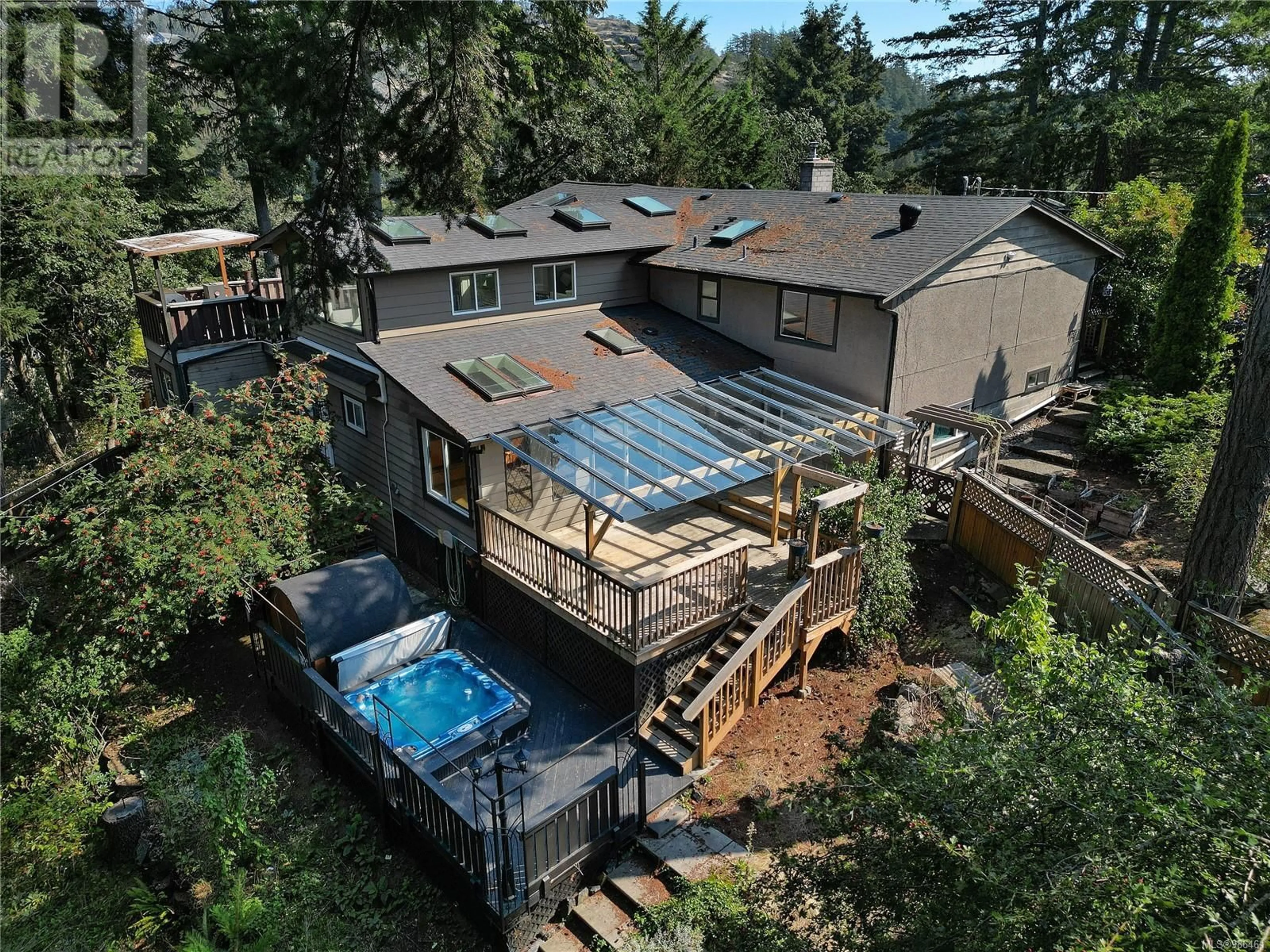 A pic from outside/outdoor area/front of a property/back of a property/a pic from drone, water/lake/river/ocean view for 2582 Rainville Rd, Langford British Columbia V9B3N1