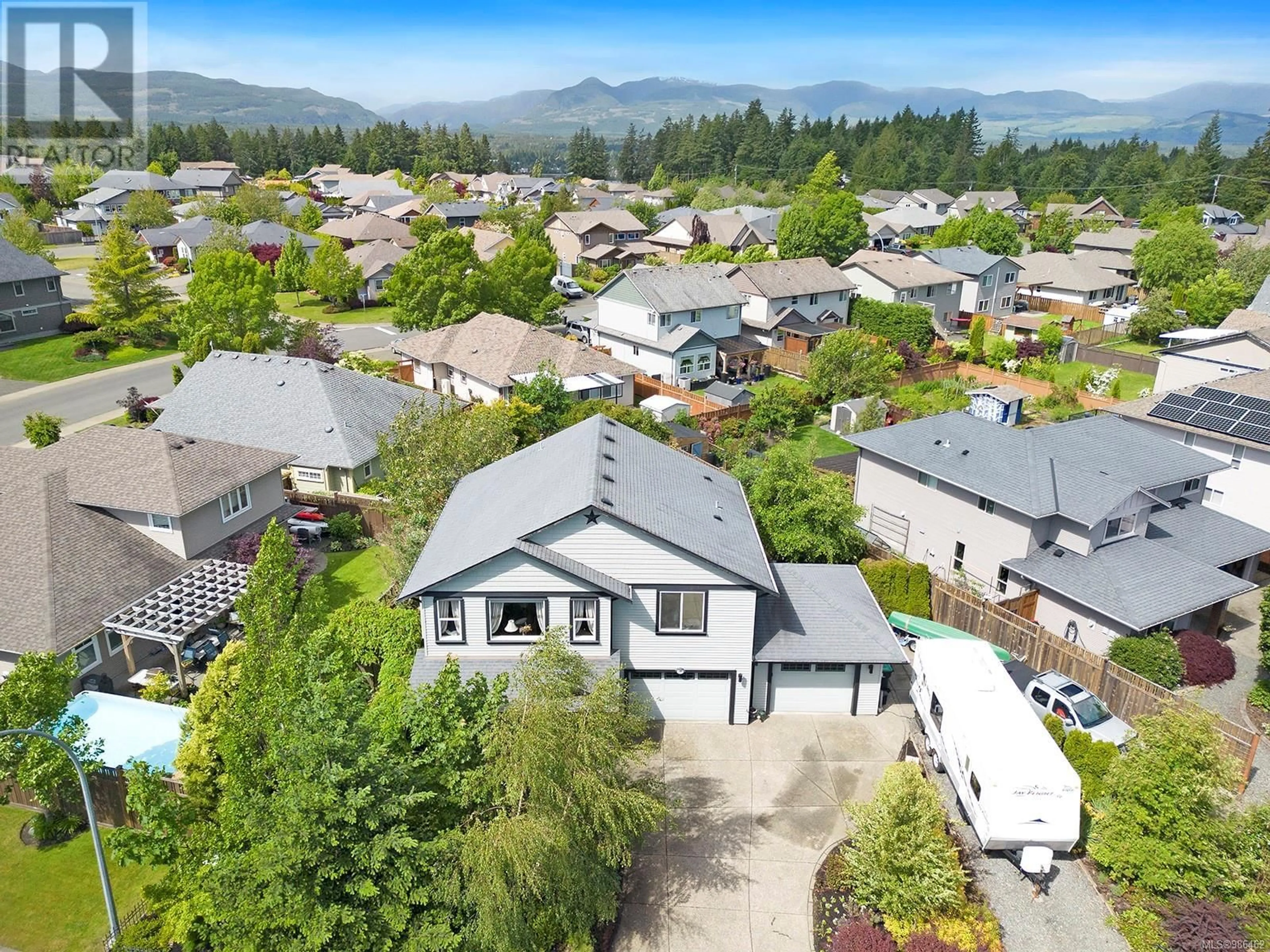 A pic from outside/outdoor area/front of a property/back of a property/a pic from drone, mountain view for 685 Lancaster Way, Comox British Columbia V9M4J3