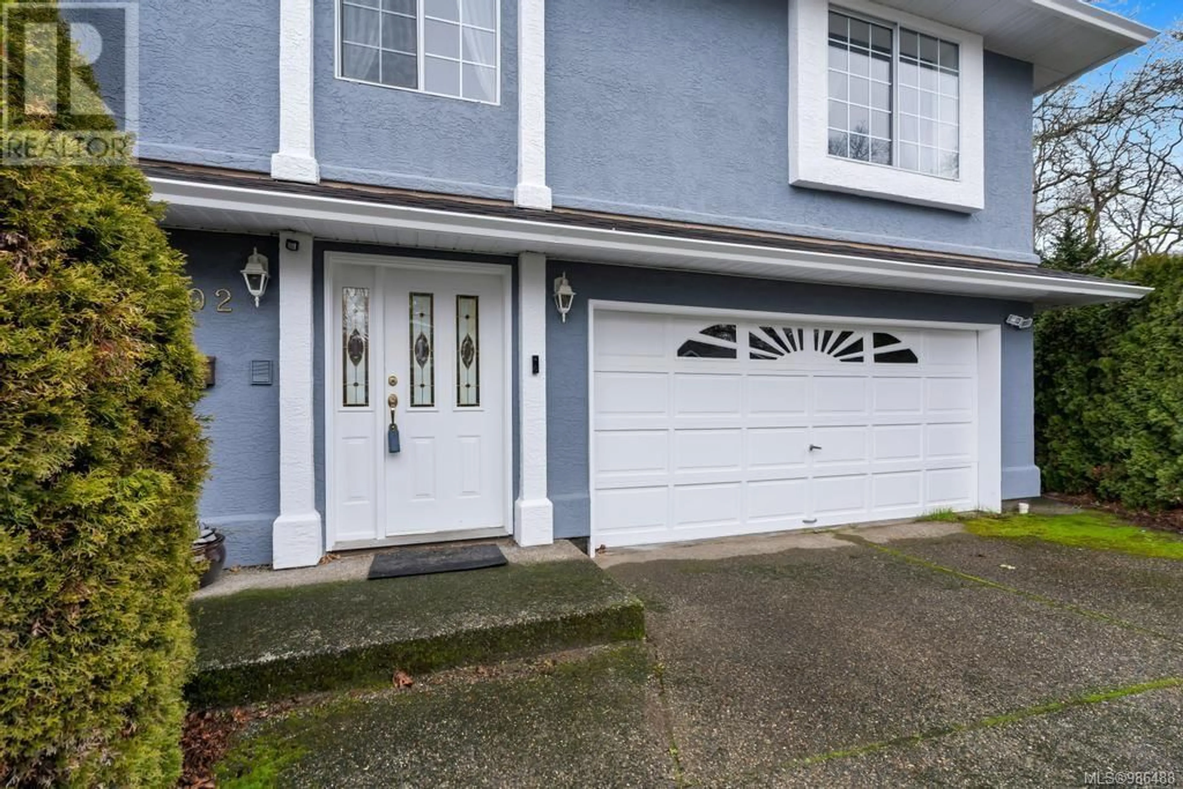 Home with vinyl exterior material, street for 1402 IRELAND Crt, Saanich British Columbia V8P5S4