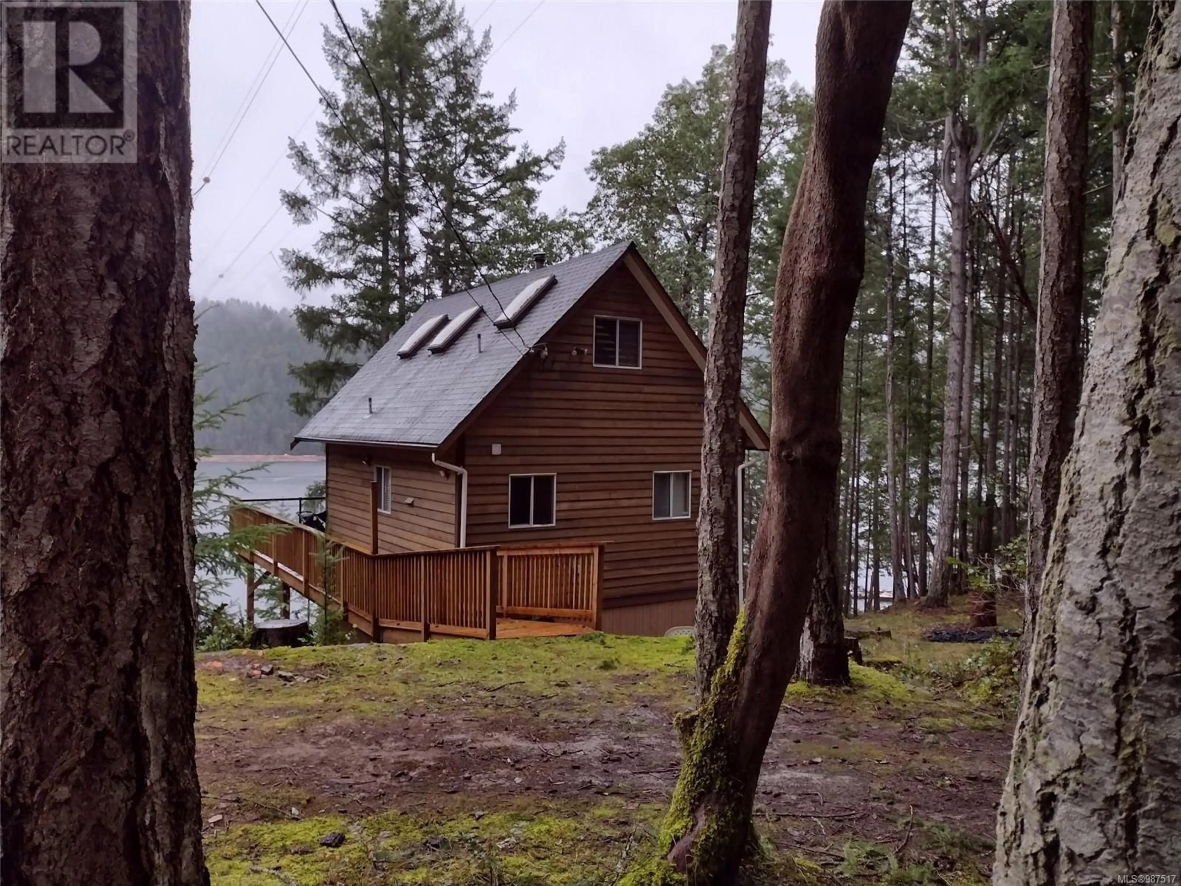 A pic from outside/outdoor area/front of a property/back of a property/a pic from drone, water/lake/river/ocean view for 288 COHO BOULEVARD, Mudge Island British Columbia V0R1X6