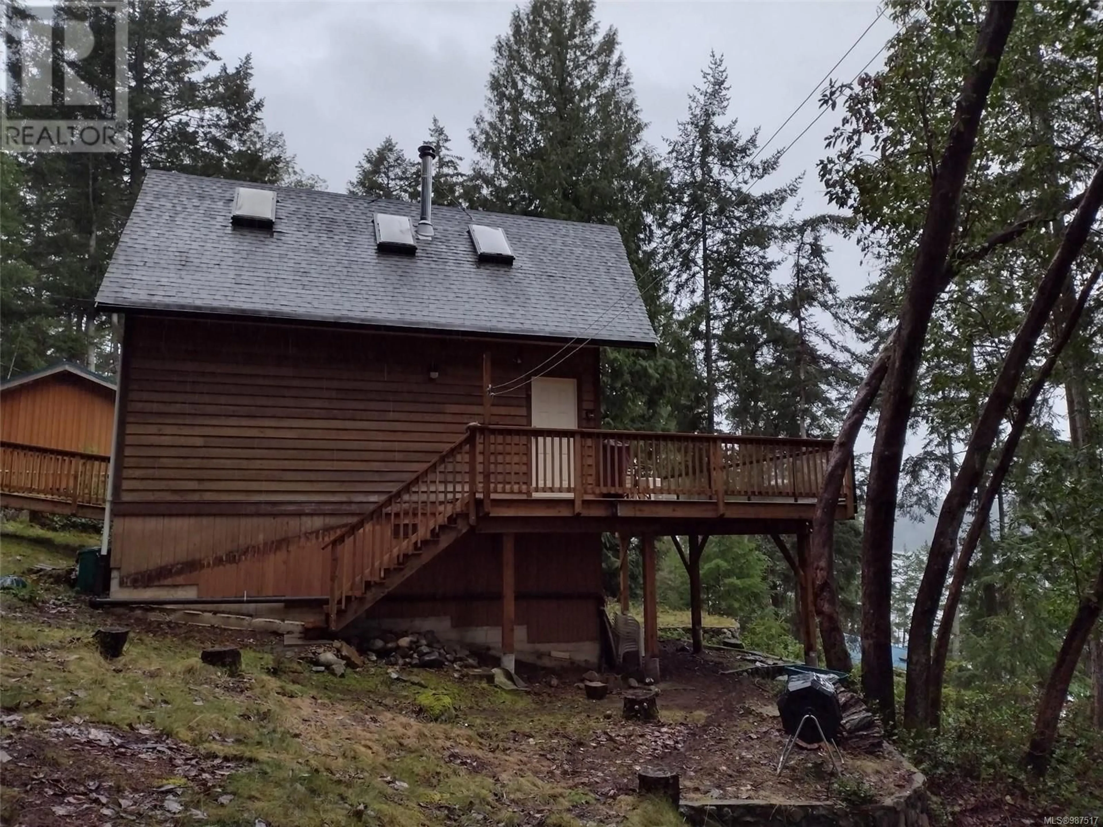 A pic from outside/outdoor area/front of a property/back of a property/a pic from drone, mountain view for 288 Coho Blvd, Mudge Island British Columbia V0R1X6