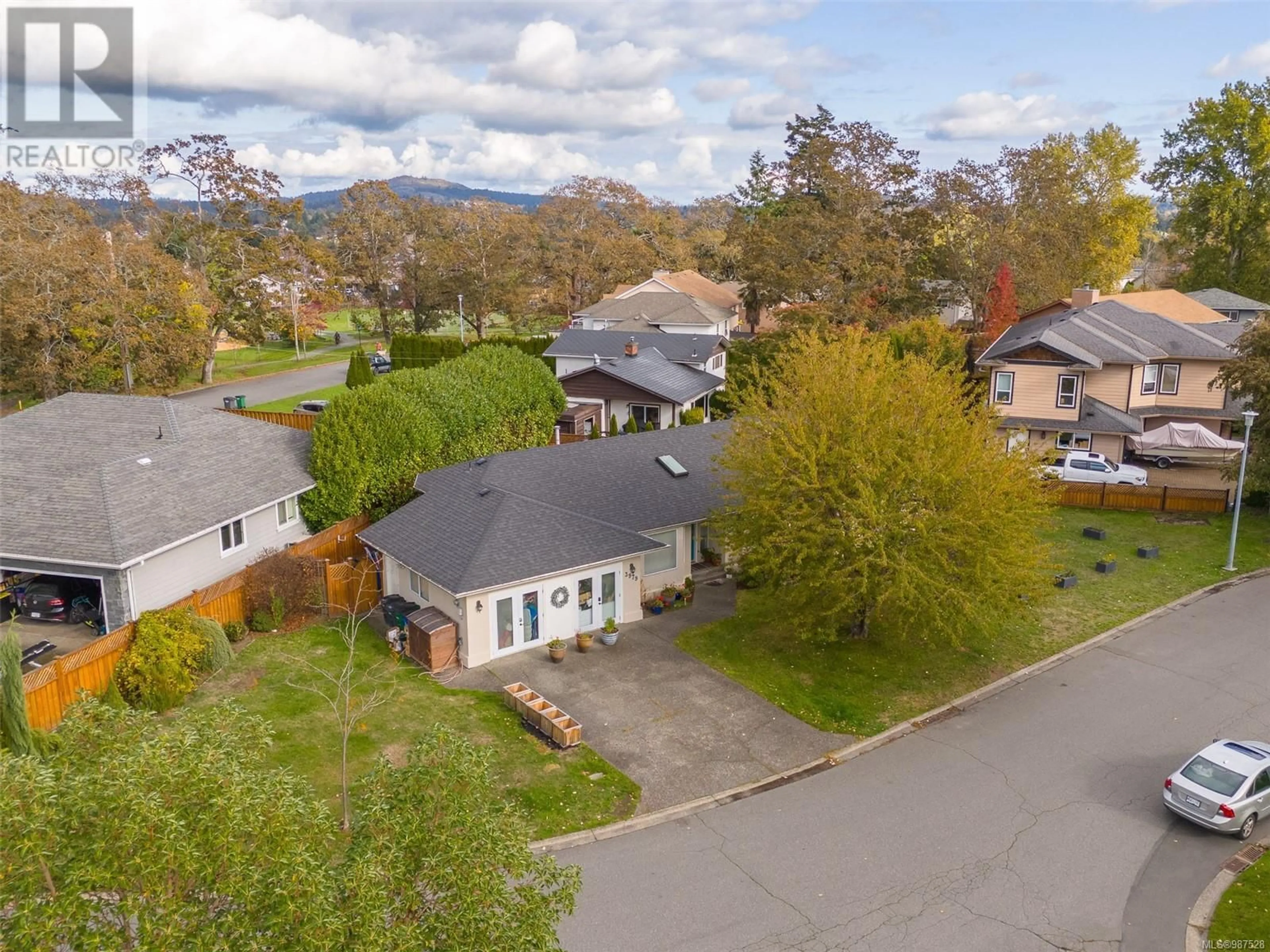 A pic from outside/outdoor area/front of a property/back of a property/a pic from drone, mountain view for 3979 Blue Ridge Pl, Saanich British Columbia V8Z2V3