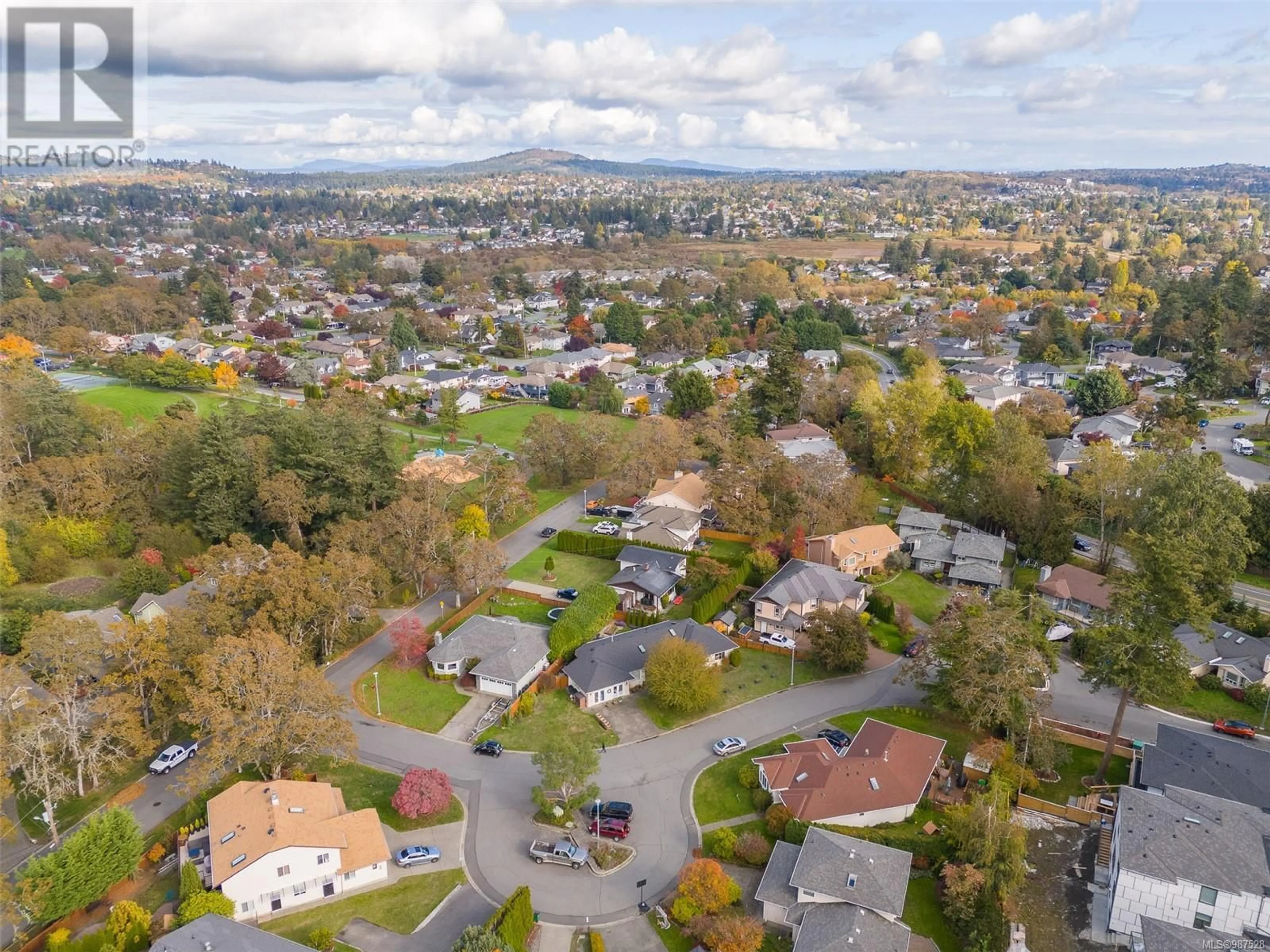 A pic from outside/outdoor area/front of a property/back of a property/a pic from drone, street for 3979 Blue Ridge Pl, Saanich British Columbia V8Z2V3