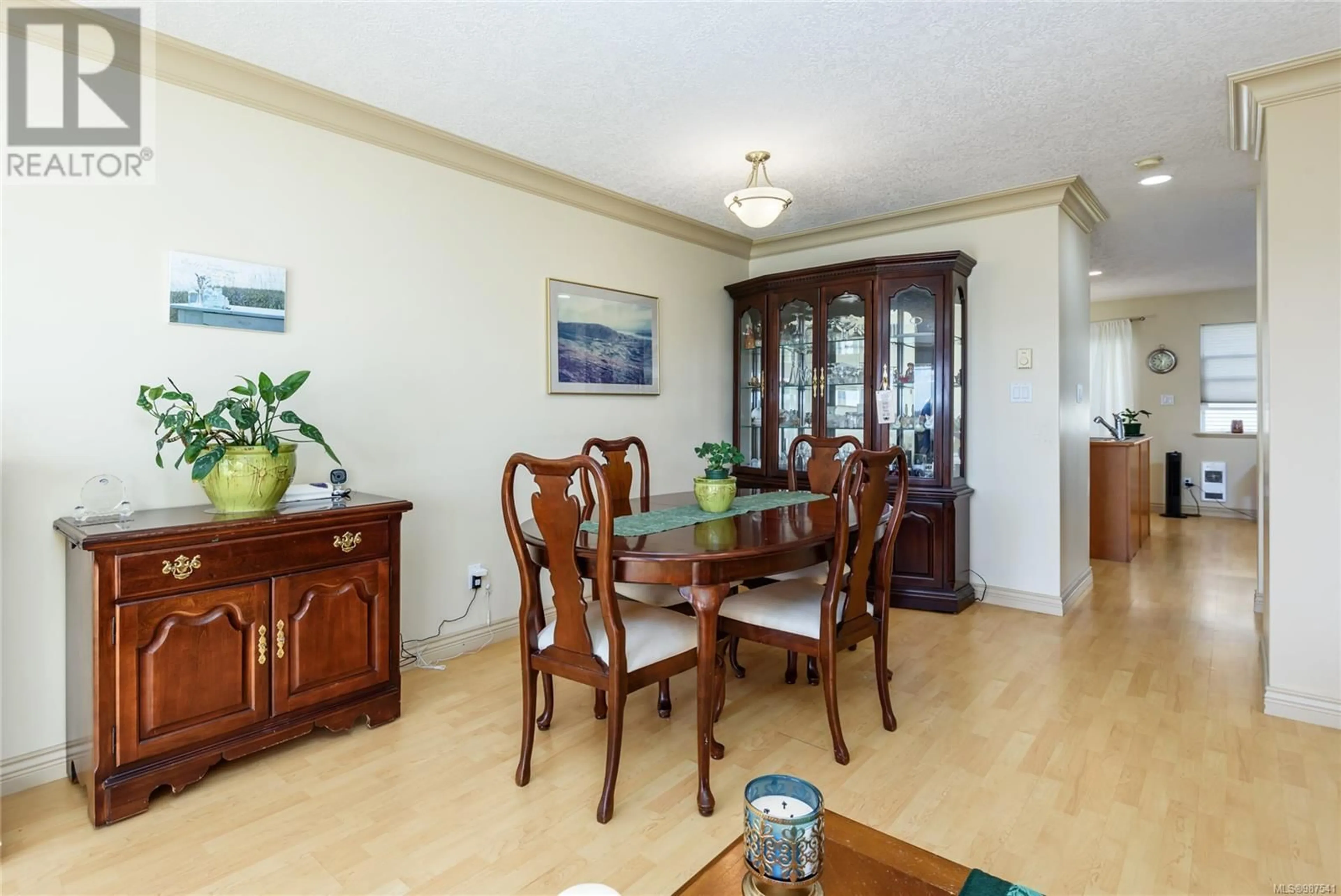 Dining room, wood/laminate floor for 3 2475 Mansfield Dr, Courtenay British Columbia V9N2M2