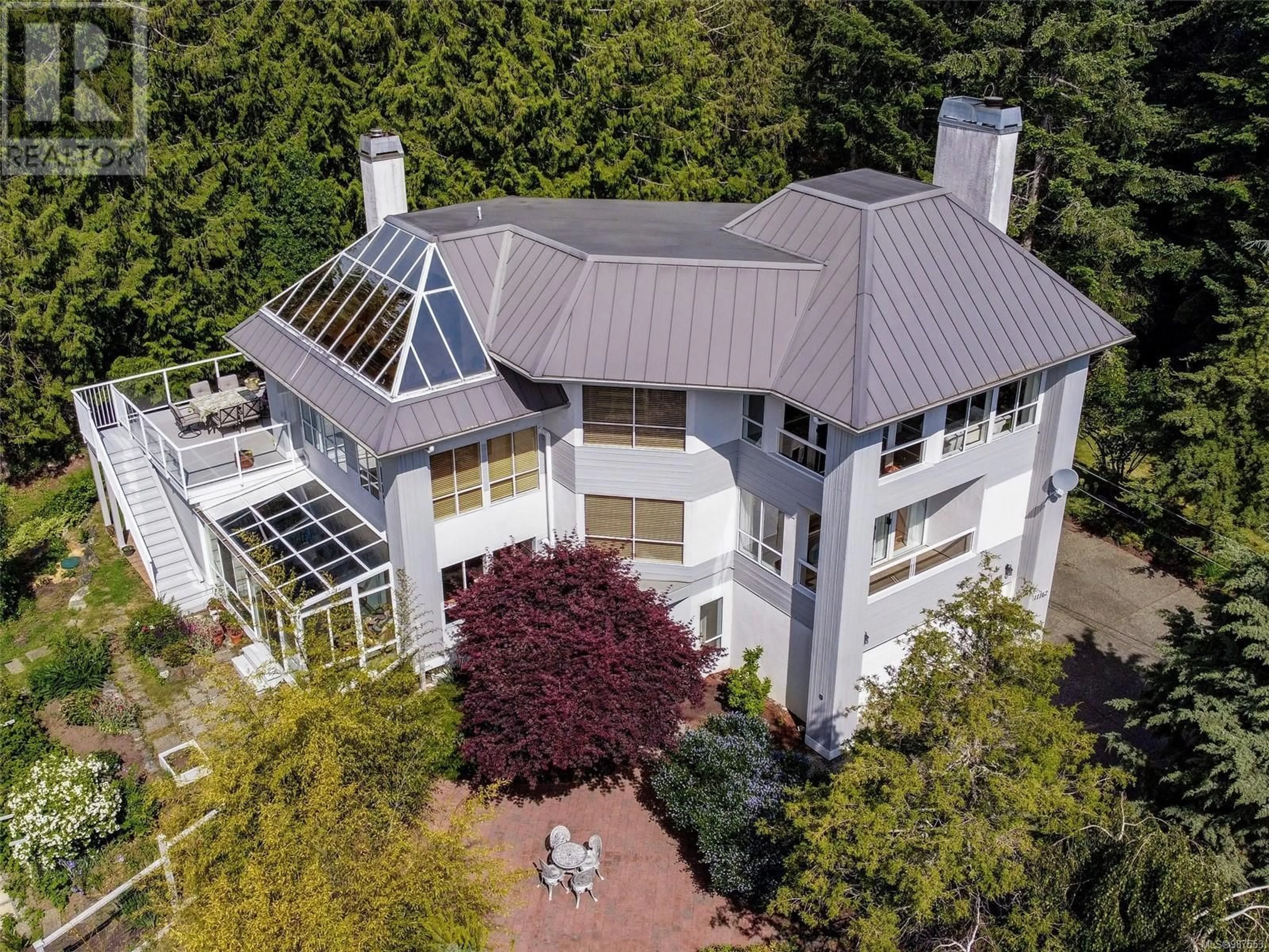 A pic from outside/outdoor area/front of a property/back of a property/a pic from drone, building for 11162 Tanager Rd, North Saanich British Columbia V8L5N5