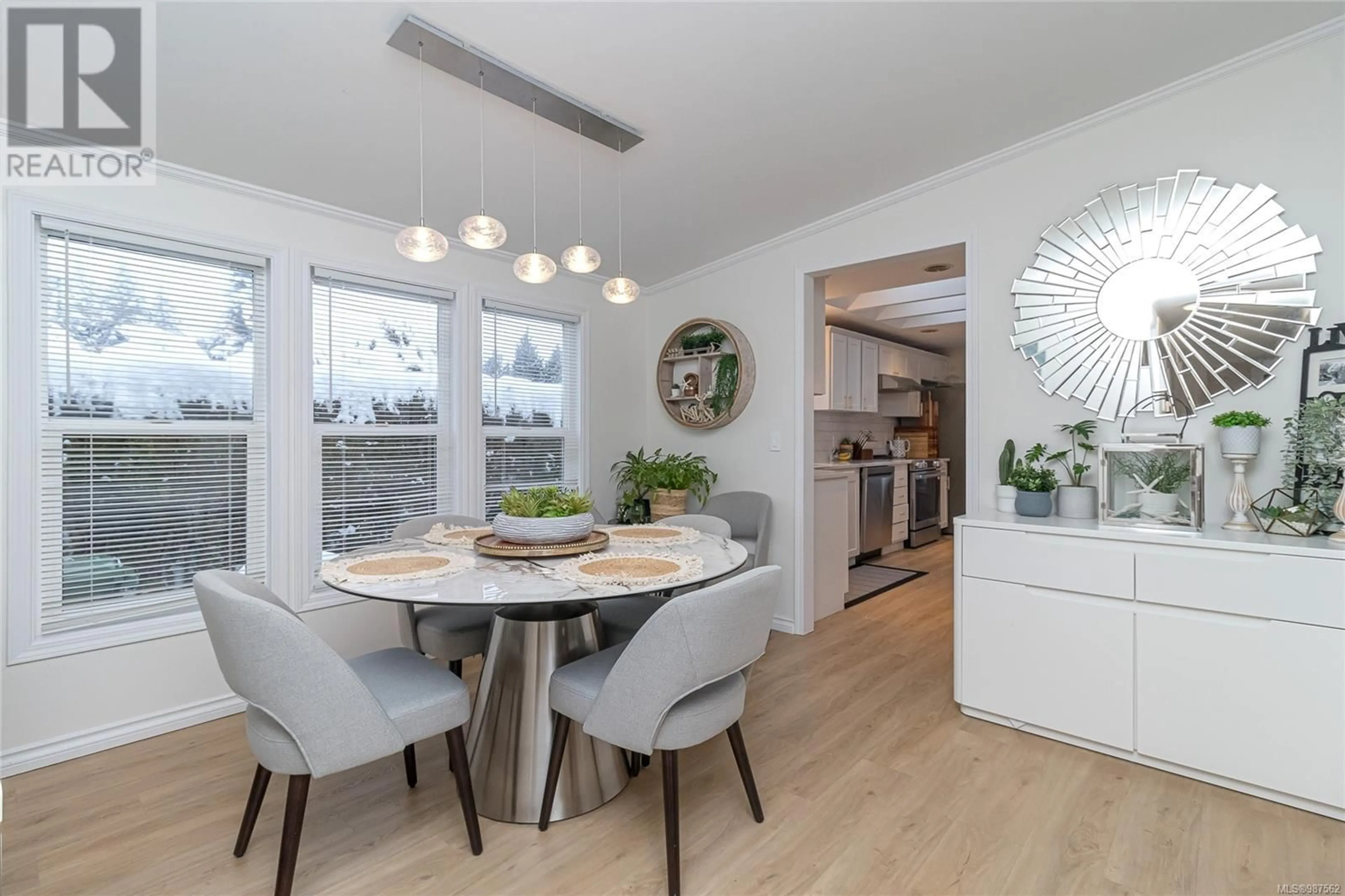 Dining room, wood/laminate floor for 7 1002 Collier Cres, Nanaimo British Columbia V9R6K6