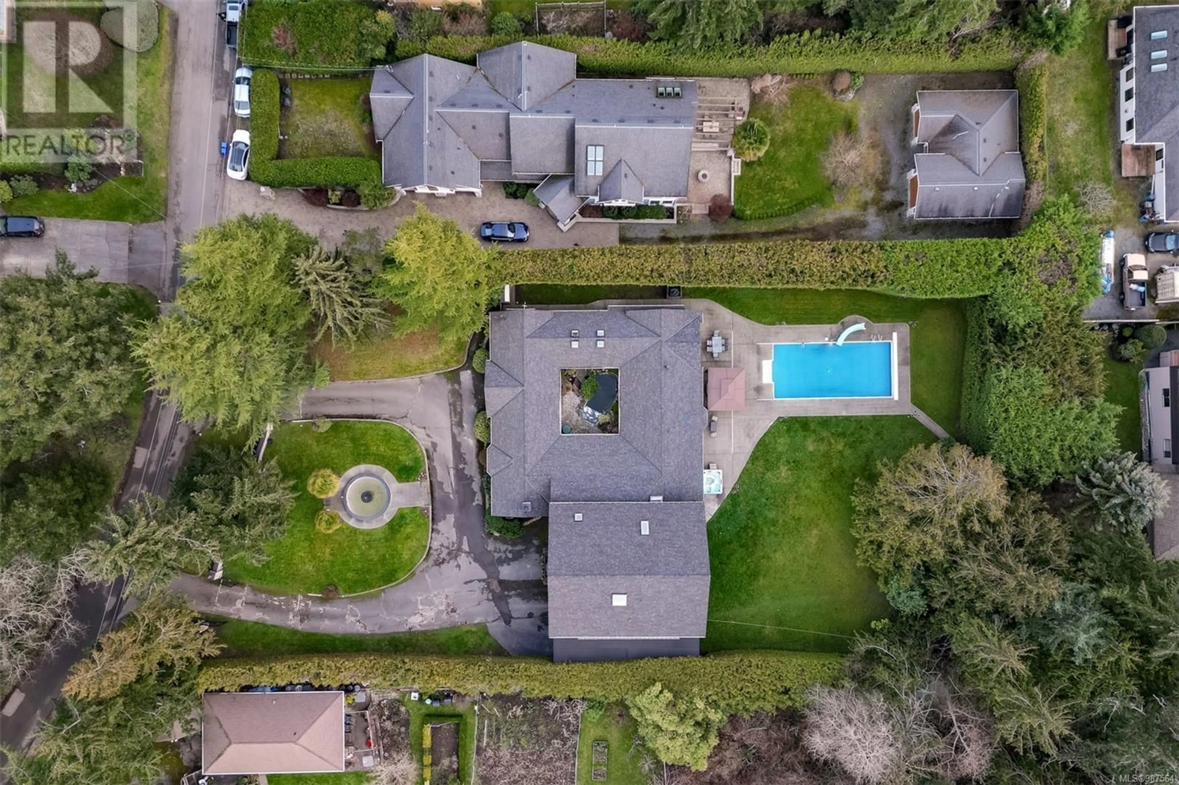 A pic from outside/outdoor area/front of a property/back of a property/a pic from drone, street for 2625 Macdonald Dr E, Saanich British Columbia V8N1Y1