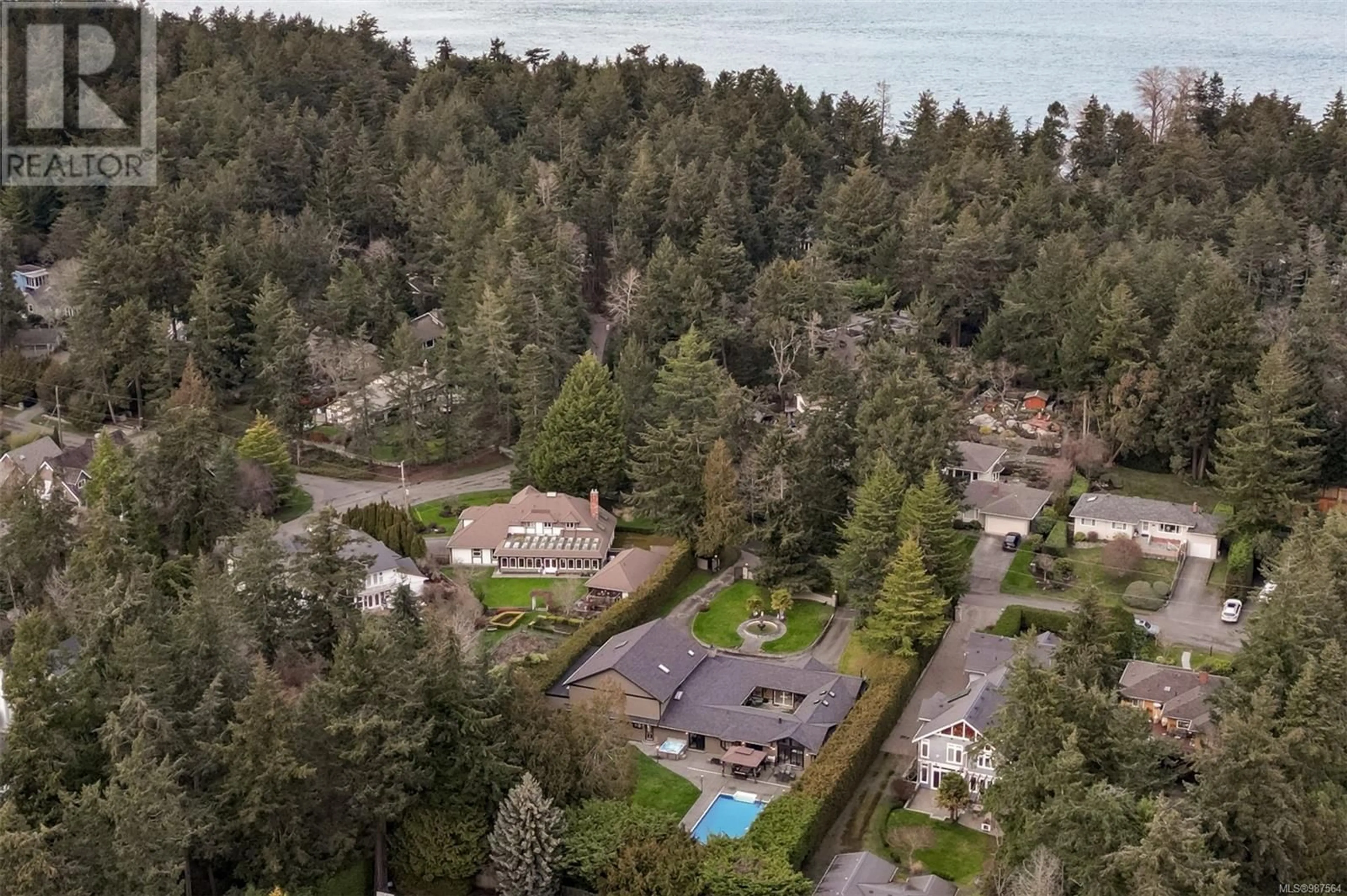 A pic from outside/outdoor area/front of a property/back of a property/a pic from drone, water/lake/river/ocean view for 2625 Macdonald Dr E, Saanich British Columbia V8N1Y1