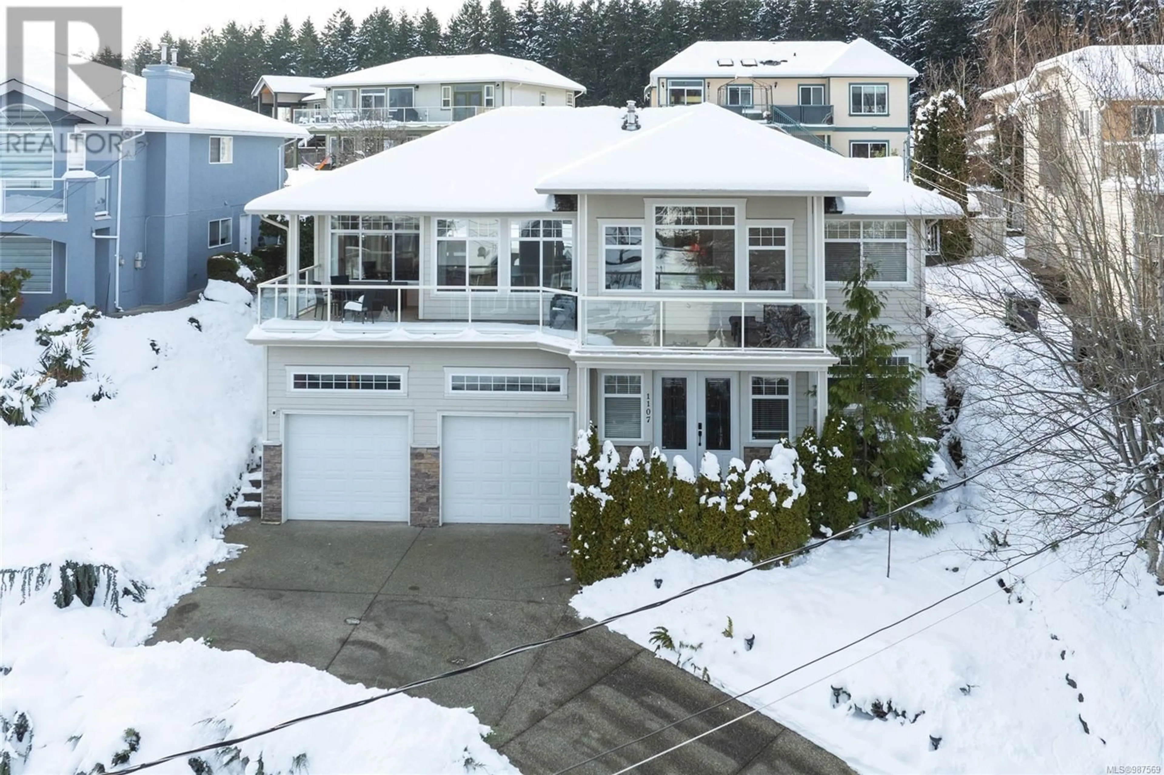 A pic from outside/outdoor area/front of a property/back of a property/a pic from drone, mountain view for 1107 College Dr, Nanaimo British Columbia V9R6A4