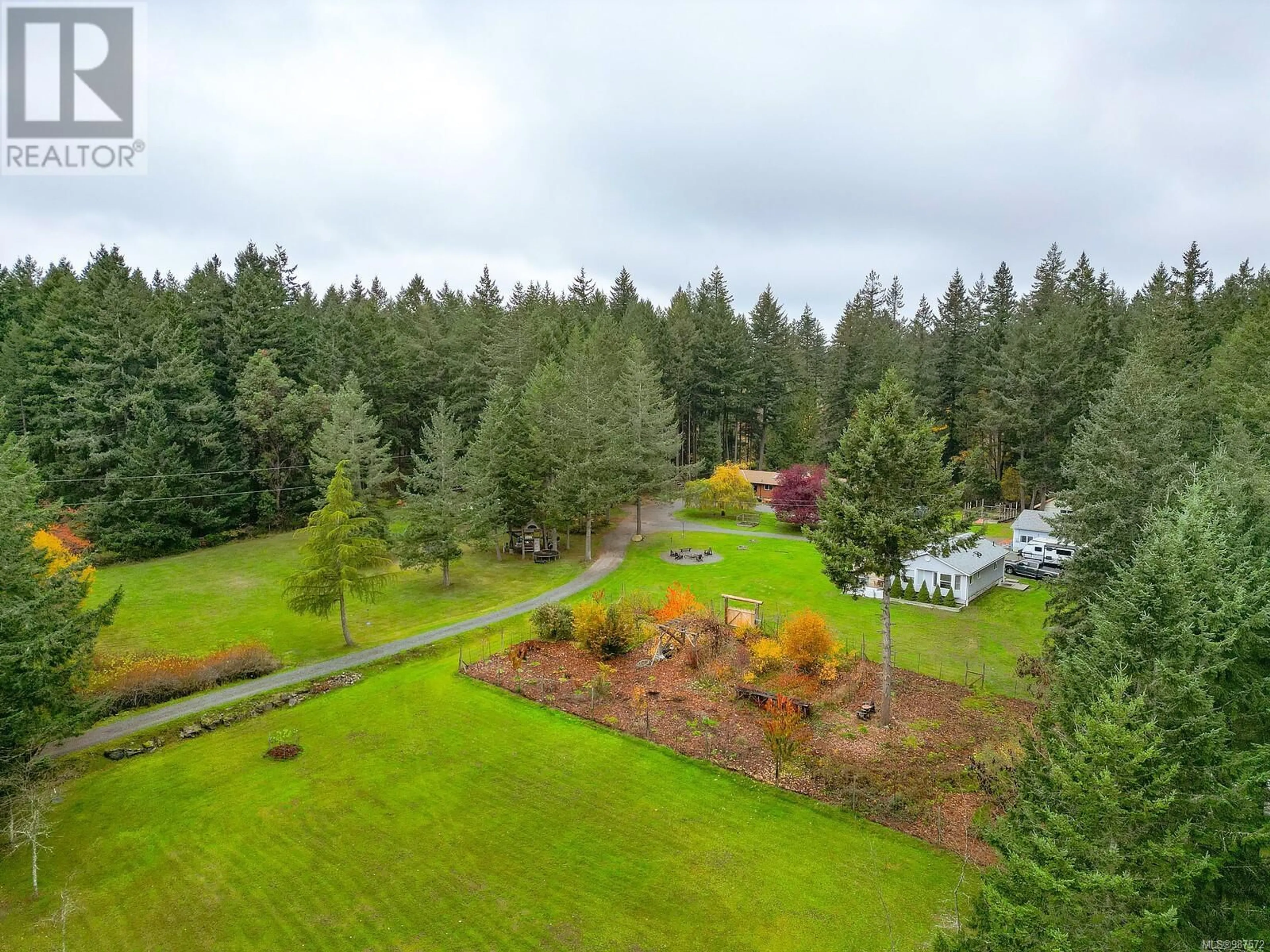 A pic from outside/outdoor area/front of a property/back of a property/a pic from drone, forest/trees view for 2730 Cedar Heights Cres SW, Nanaimo British Columbia V9X1N9